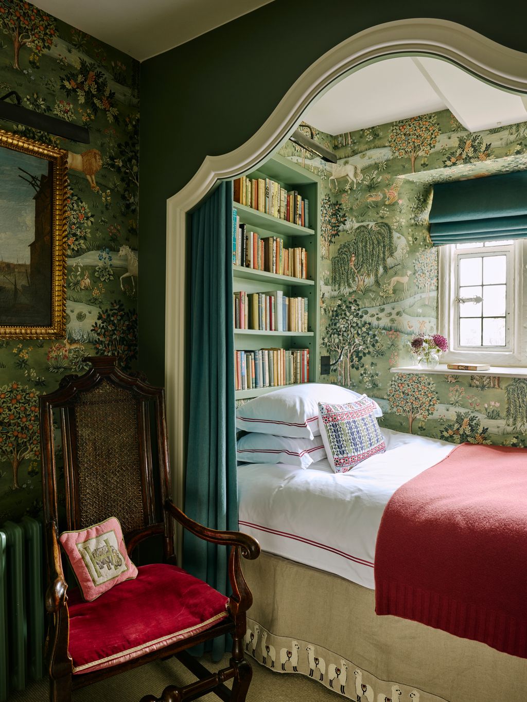 Image may contain Chair Furniture Home Decor Bed Cushion Art Painting Indoors Interior Design Bedroom and Room