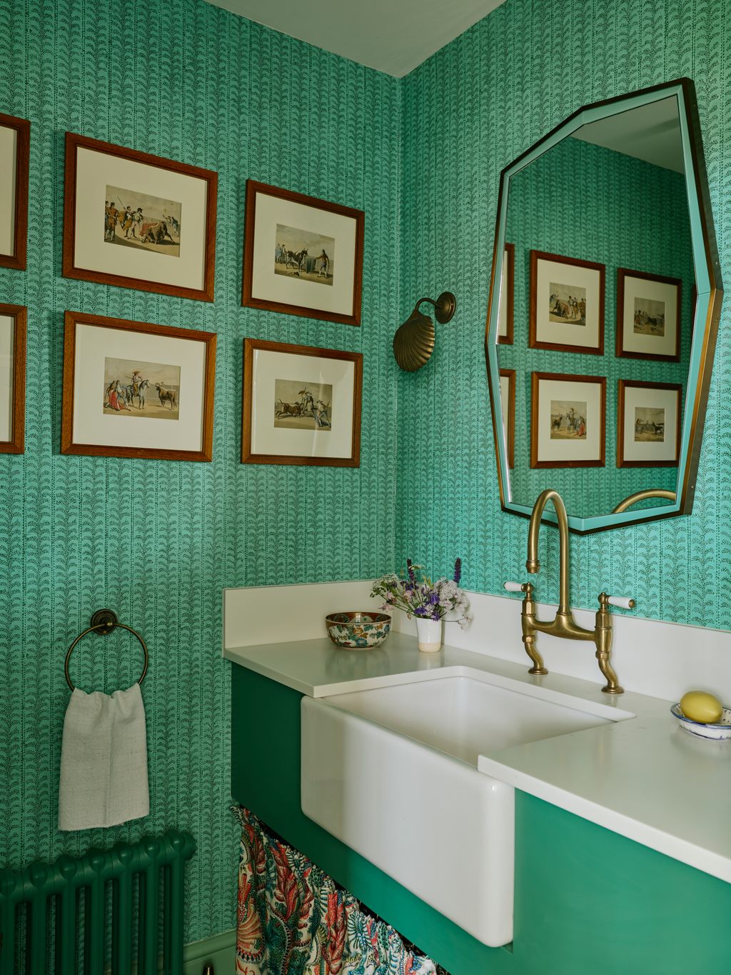 Image may contain Sink Sink Faucet Art Painting Lamp Person Indoors and Interior Design