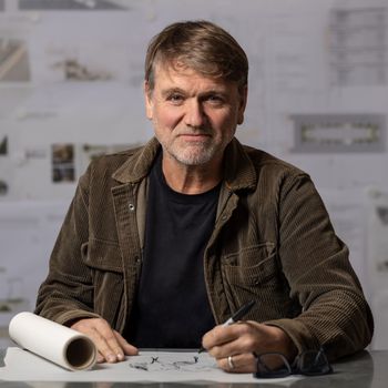 Image may contain: Pen, Adult, Person, Accessories, Jewelry, Ring, Glasses, Face, Head, Photography, and Portrait