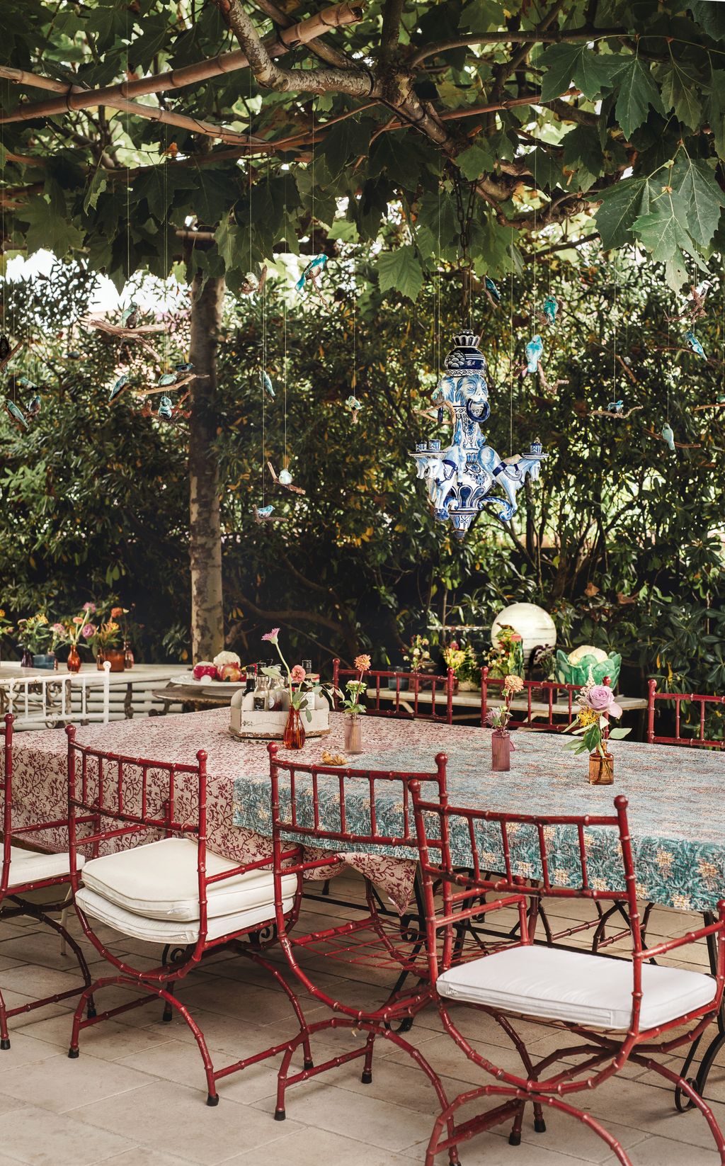 Image may contain Architecture Building House Housing Patio Dining Table Furniture Table Hotel Resort and Garden