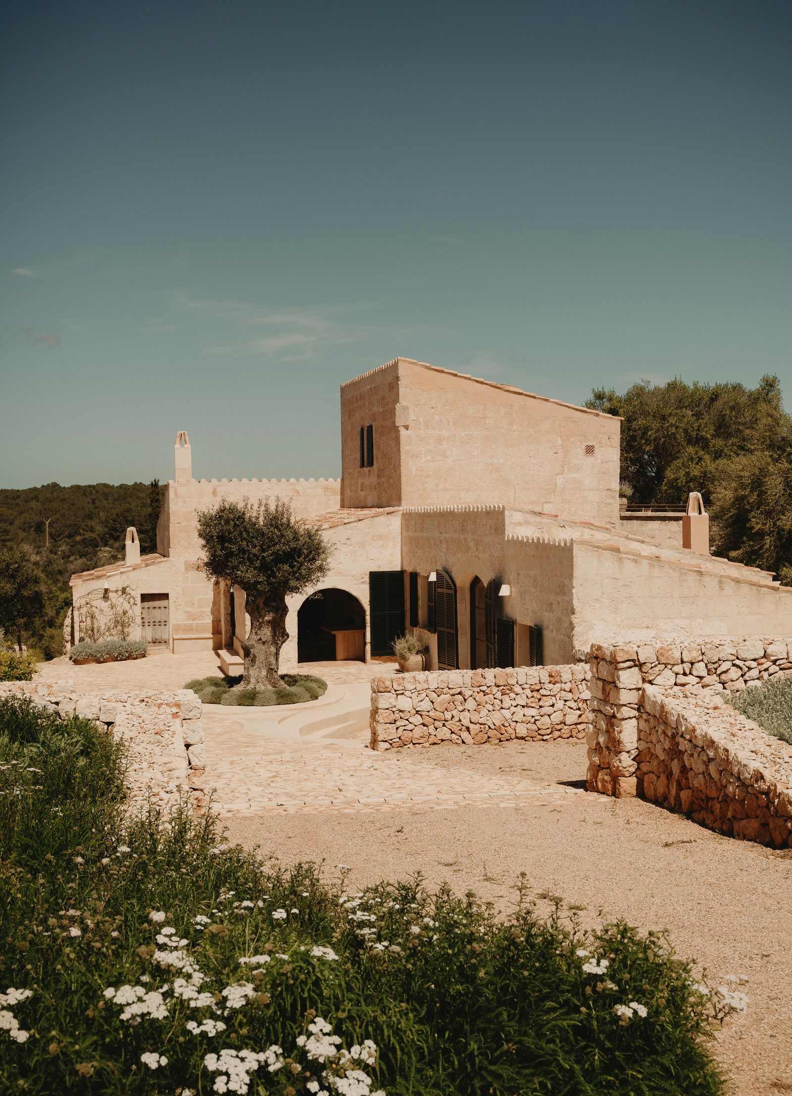 Image may contain Architecture Building House Housing Villa Hacienda and Plant