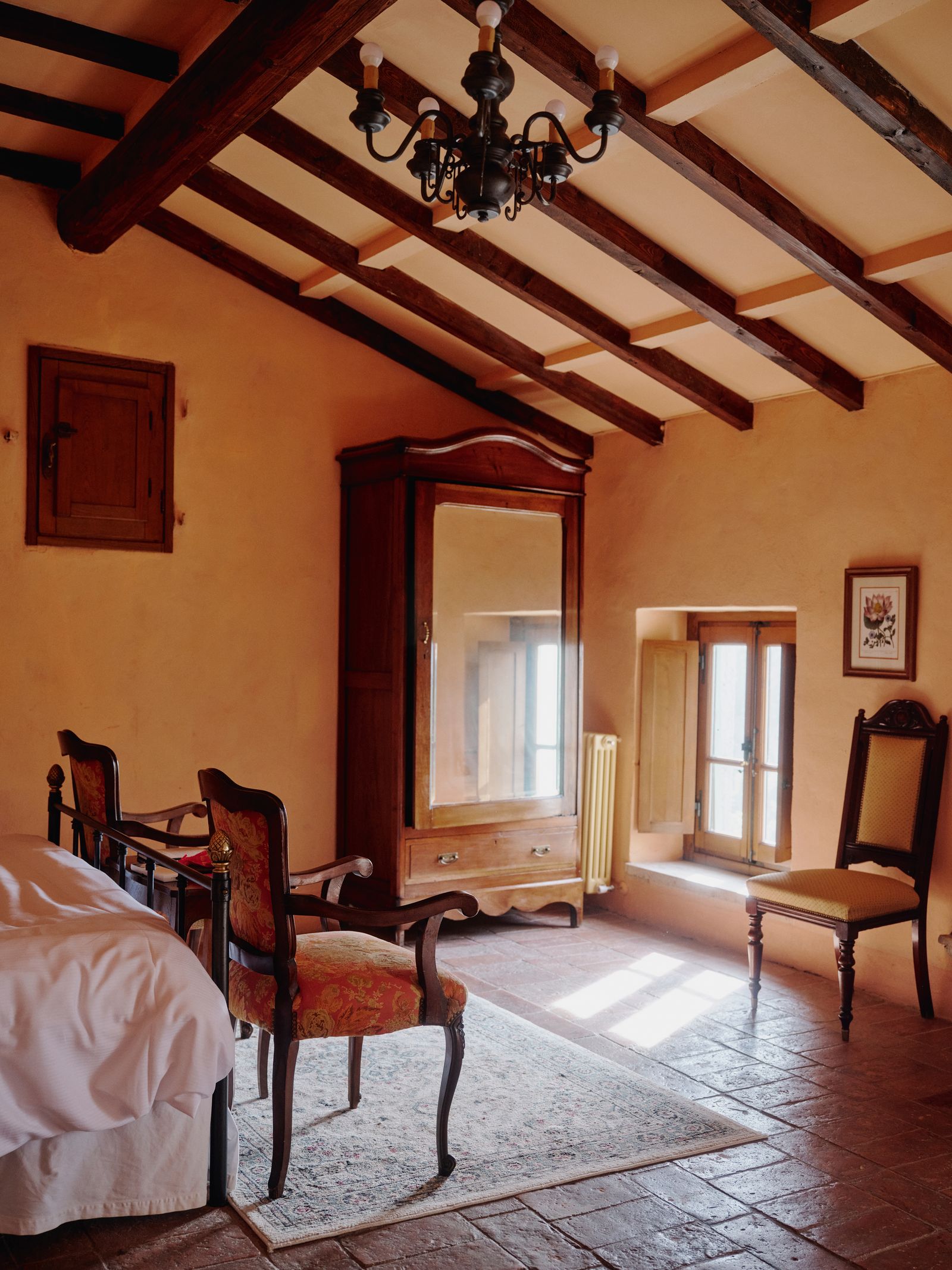 Image may contain Lamp Chair Furniture Bed Art Painting Indoors Interior Design Floor Home Decor Rug and Flooring