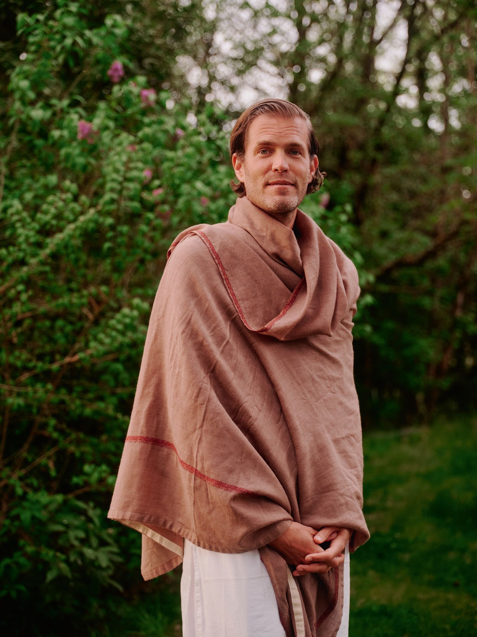 Image may contain Blanket Adult and Person