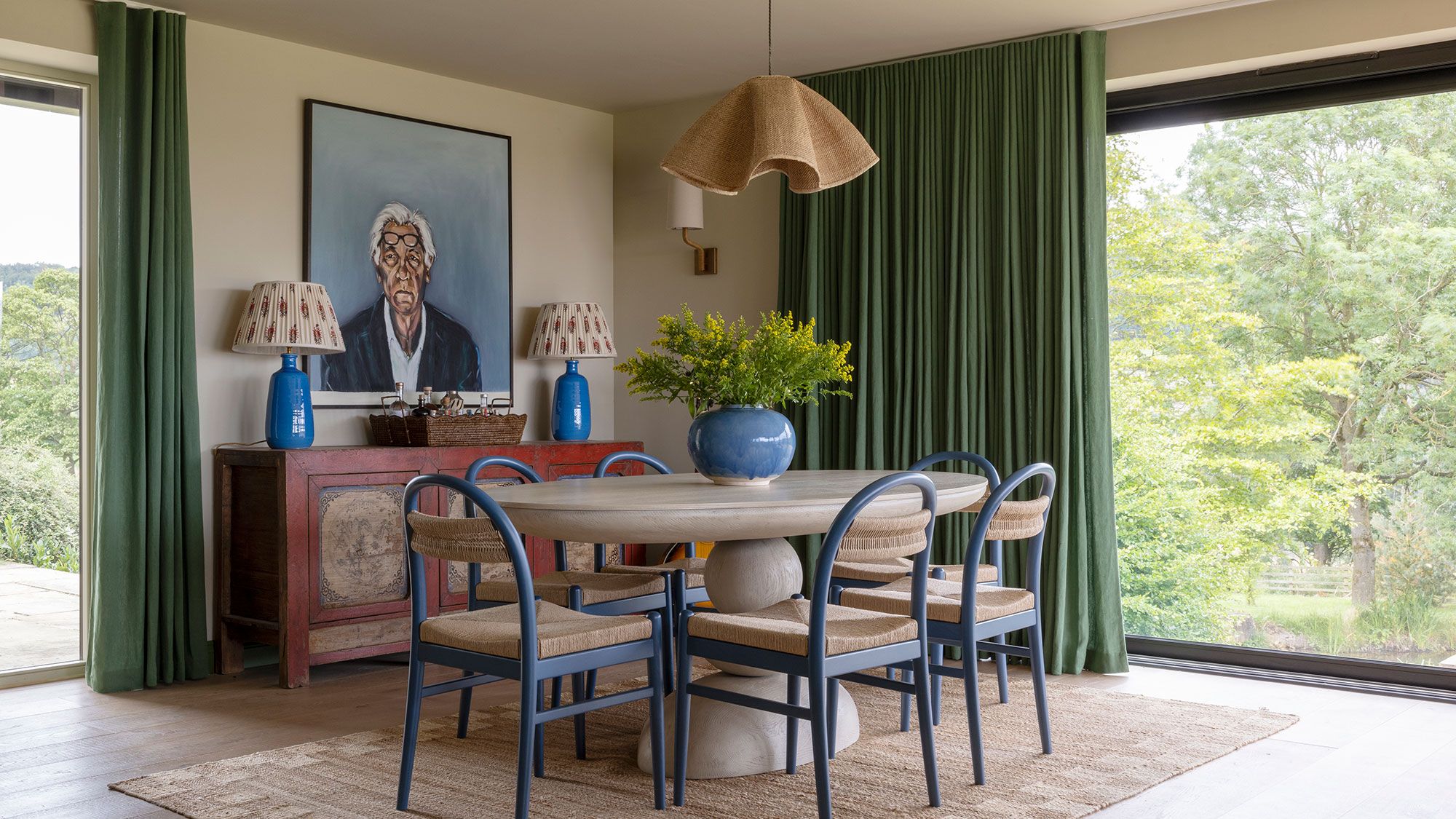 Image may contain: Architecture, Building, Dining Room, Dining Table, Furniture, Indoors, Room, Table, Lamp, and Desk