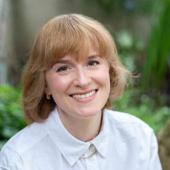 Image may contain: Face, Happy, Head, Person, Smile, Photography, Portrait, Child, Body Part, Neck, Blonde, and Hair