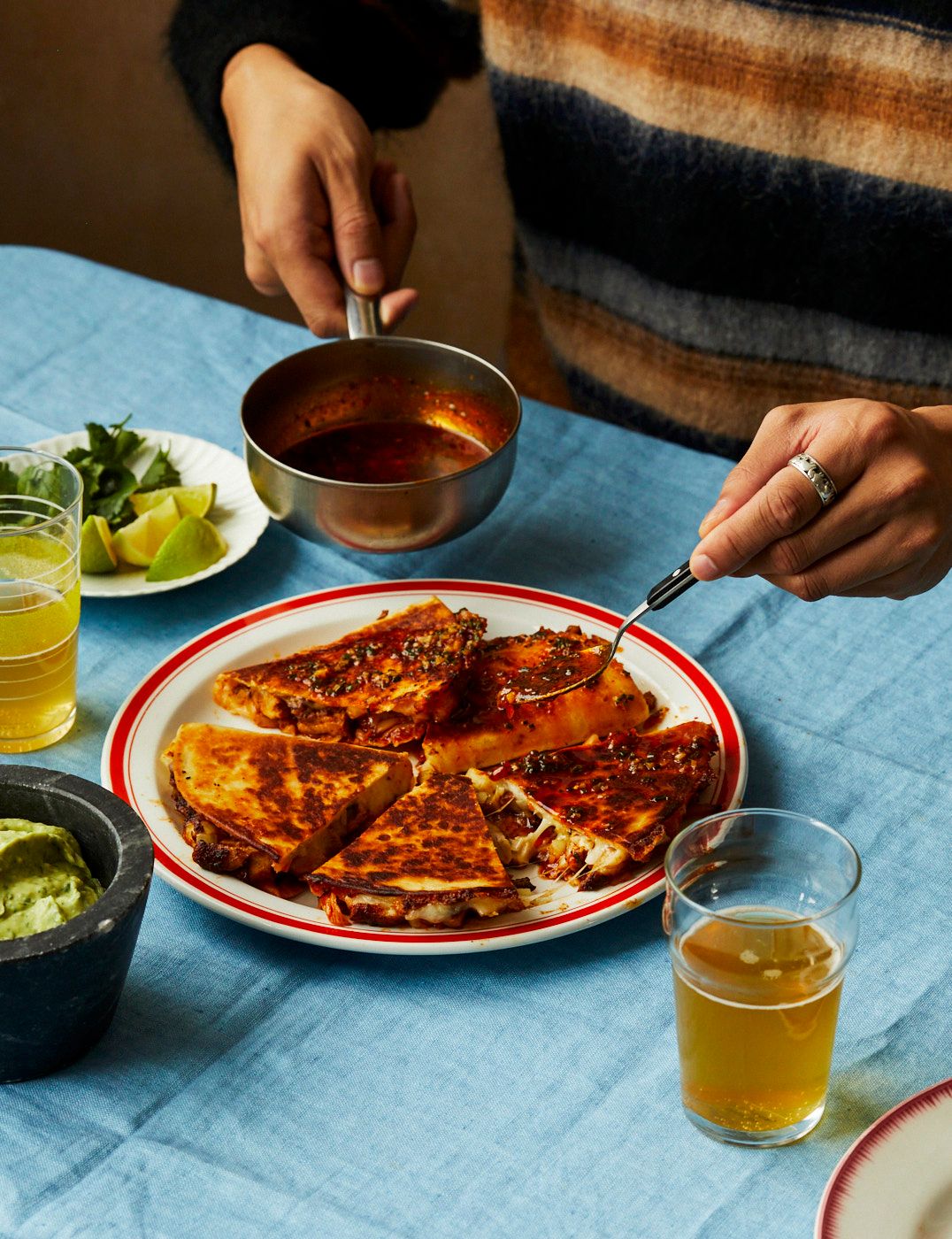 Image may contain Cup Accessories Jewelry Ring Food Food Presentation Plate Adult Person and Dining Table