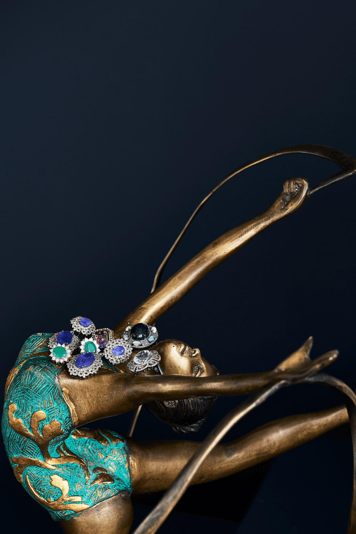 Image may contain: Scopas, Bronze, Accessories, Adult, Person, Gemstone, Jewelry, Smoke Pipe, Face, and Head