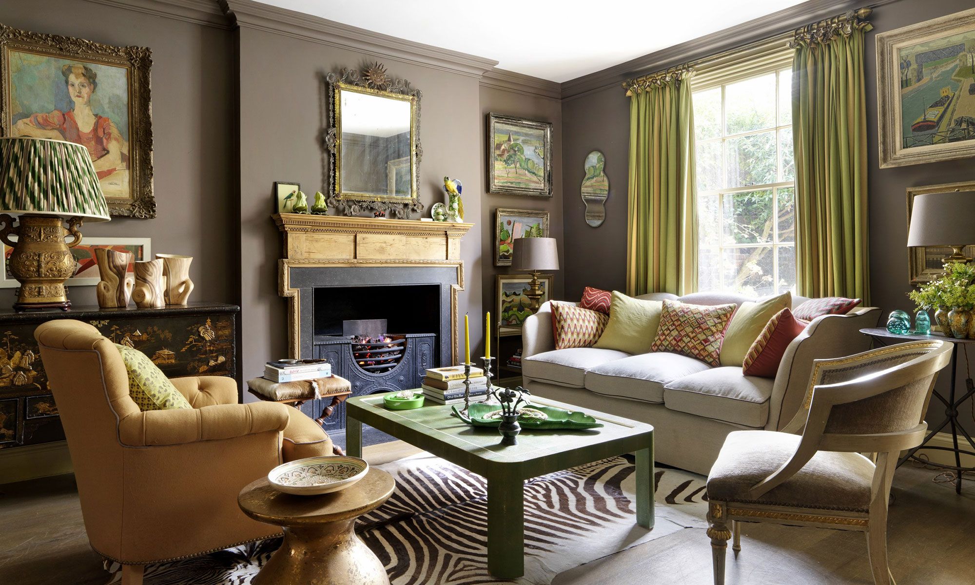 Image may contain: Maxwell Holt, Home Decor, Furniture, Table, Lamp, Architecture, Building, Indoors, Living Room, and Room