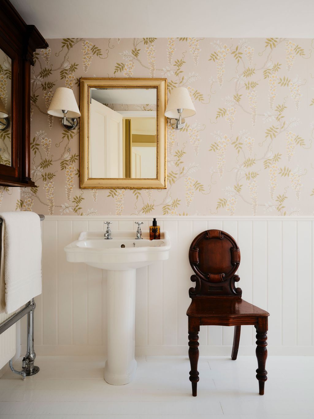 Image may contain Lamp Sink Sink Faucet Chair Furniture Indoors and Interior Design