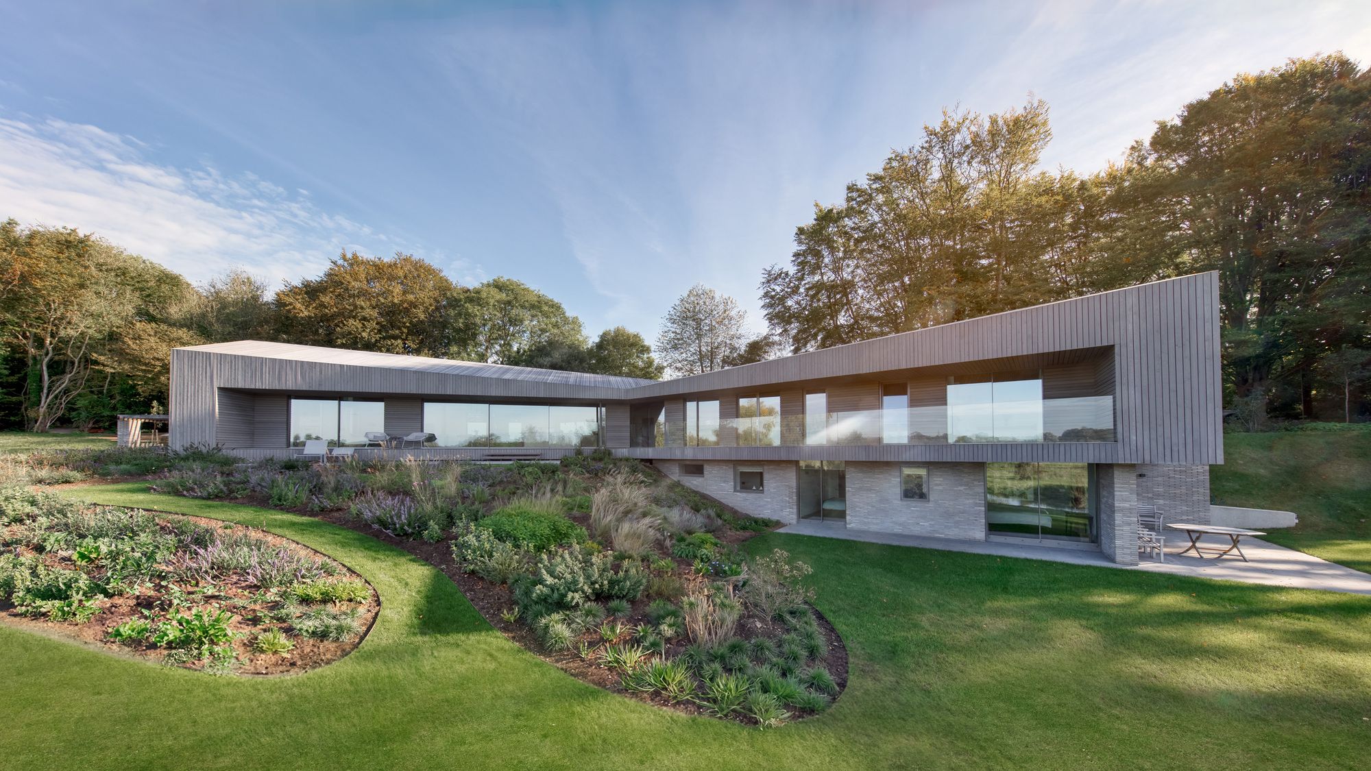 Image may contain: Grass, Plant, Architecture, Building, House, Housing, Villa, Lawn, Backyard, Nature, Outdoors, and Yard