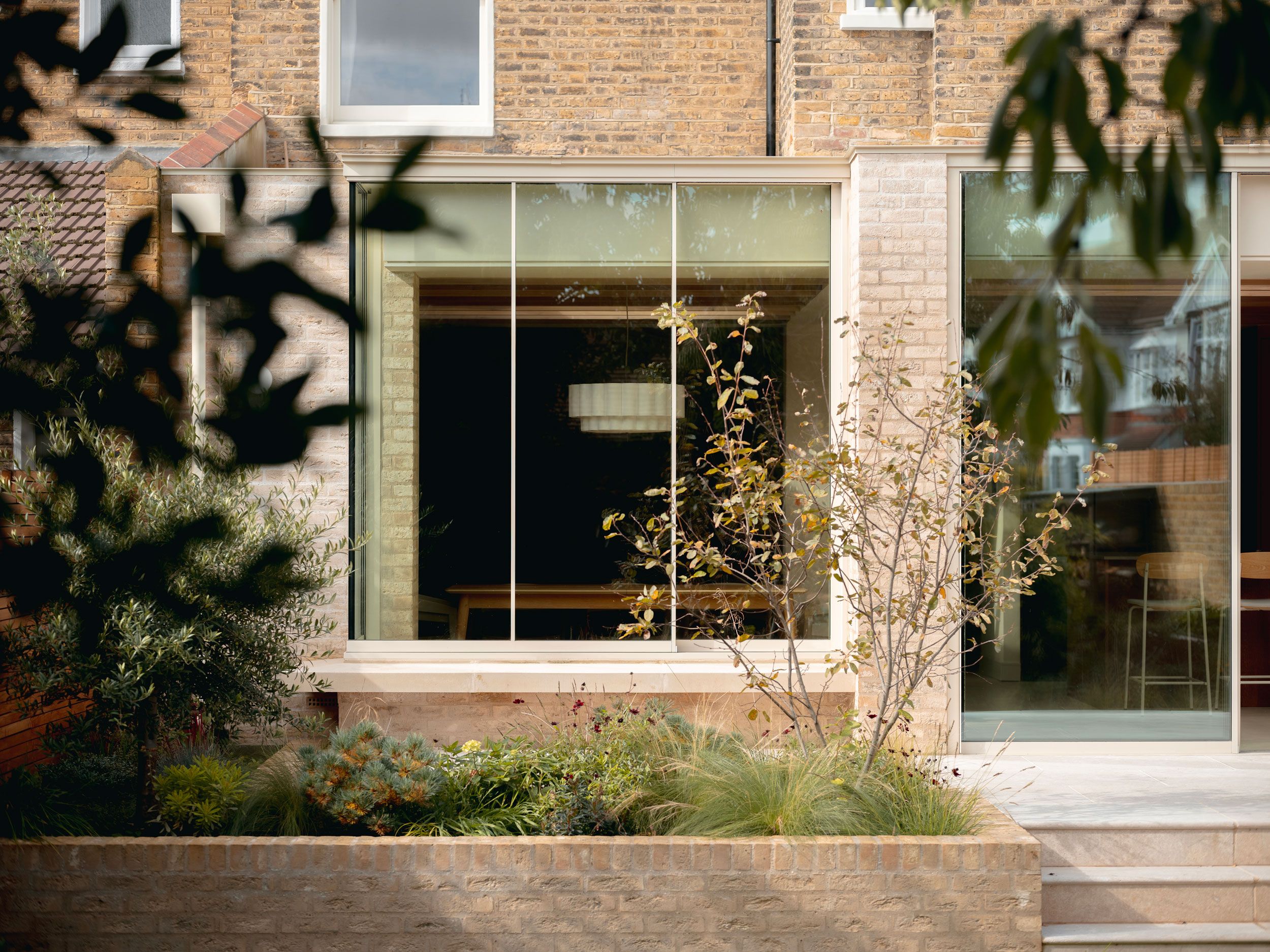 Image may contain: Chair, Furniture, Window, Door, Home Decor, and Bench