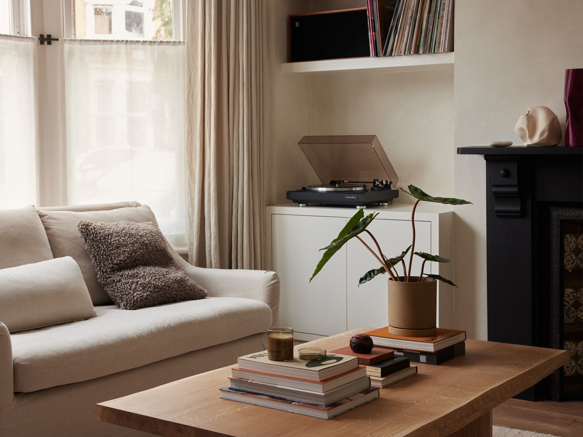 Image may contain: Furniture, Table, Coffee Table, Architecture, Building, Indoors, Living Room, Room, and Interior Design