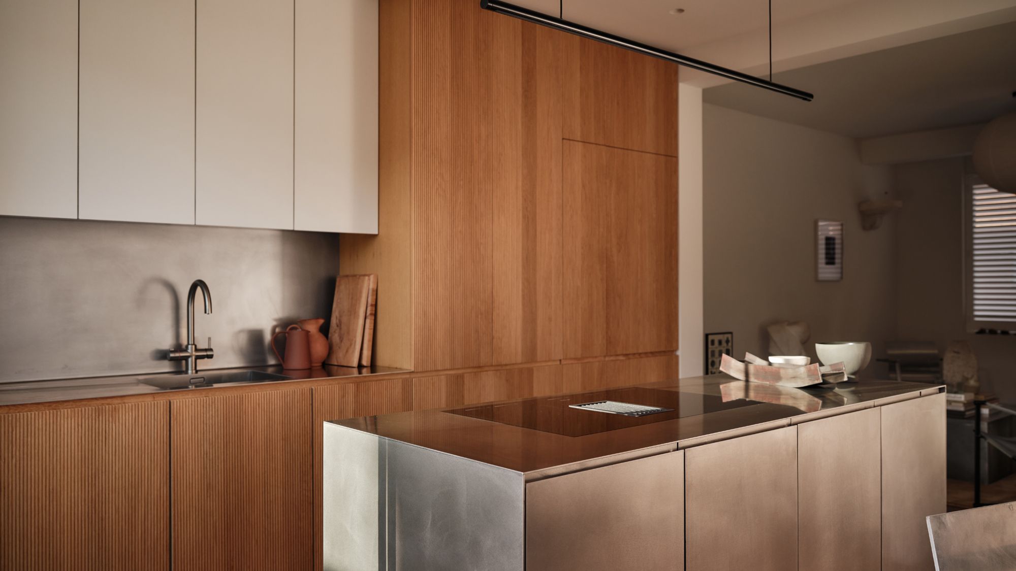 Image may contain: Indoors, Interior Design, Kitchen, Sink, Sink Faucet, and Kitchen Island