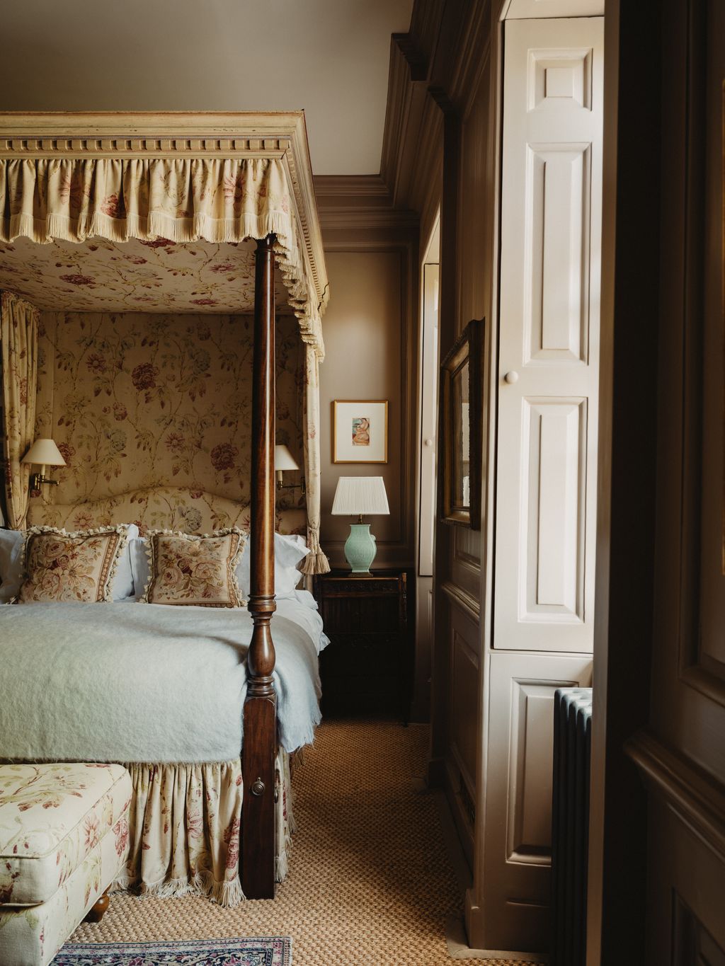 Image may contain Furniture Indoors Bed Bedroom Room Lamp Art Painting Home Decor Rug Canopy Bed and Couch