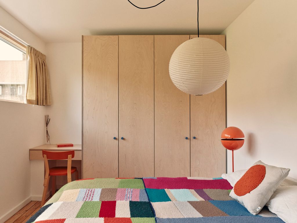 Image may contain Lamp Indoors Interior Design Home Decor Chair Furniture Ball Basketball and Basketball