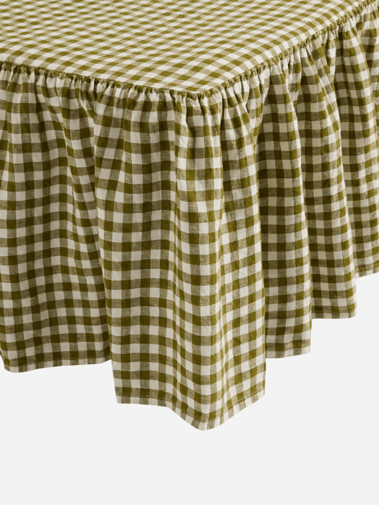 Image may contain: Tablecloth, Clothing, and Coat