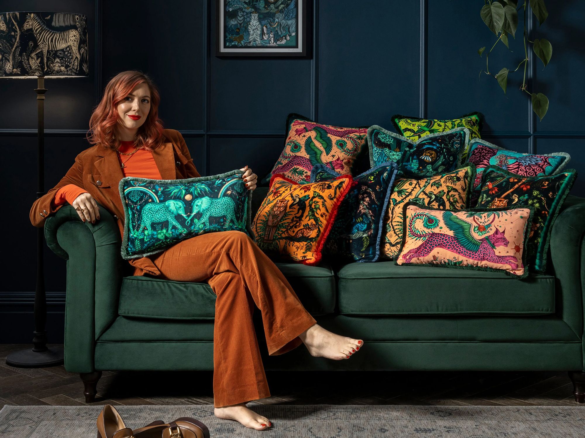 Image may contain: Elisa Miller, Cushion, Home Decor, Person, Sitting, Couch, Furniture, Adult, Accessories, Bag, and Handbag