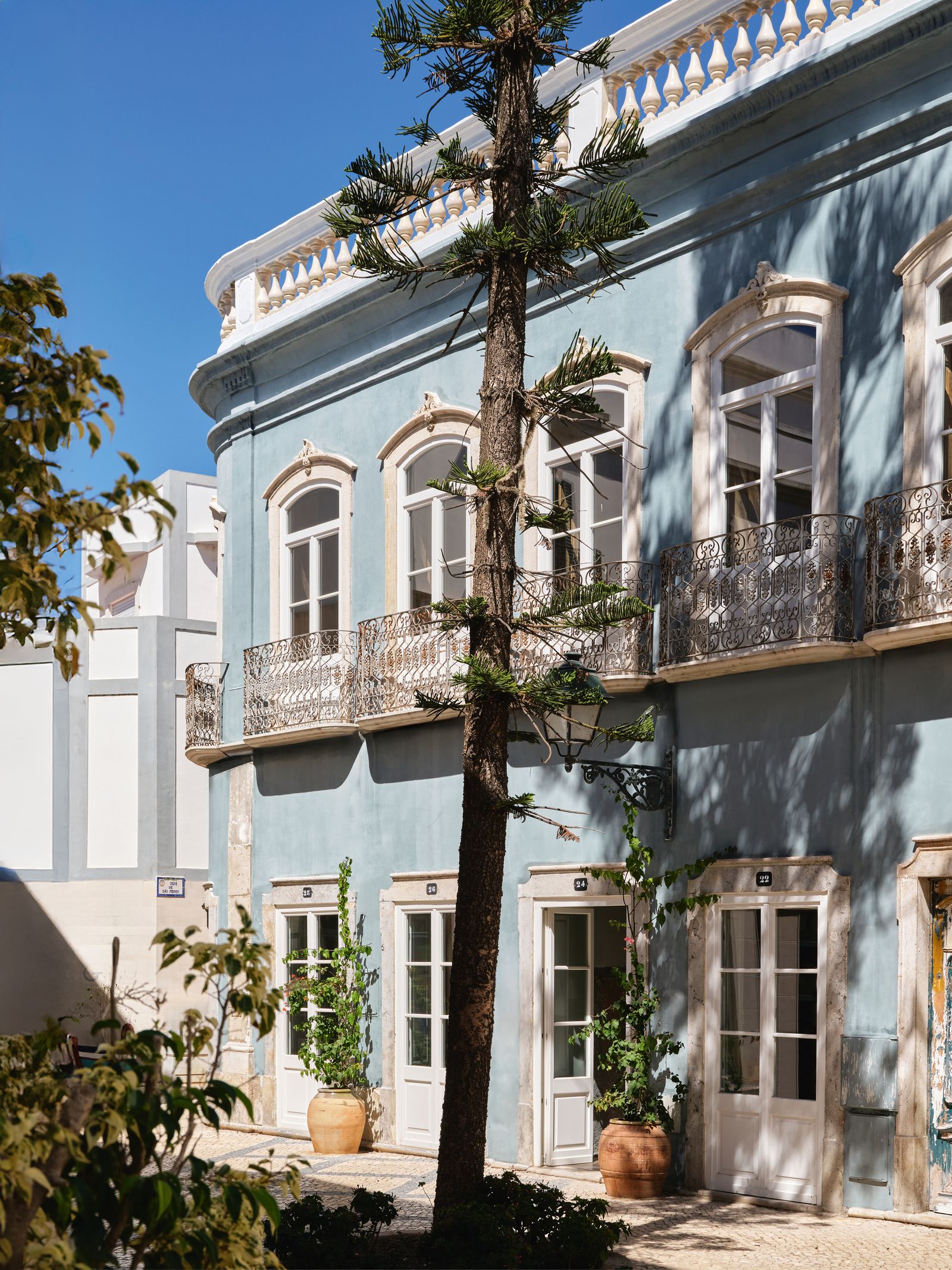 Image may contain Plant City Window Architecture Building Housing French Window and Urban