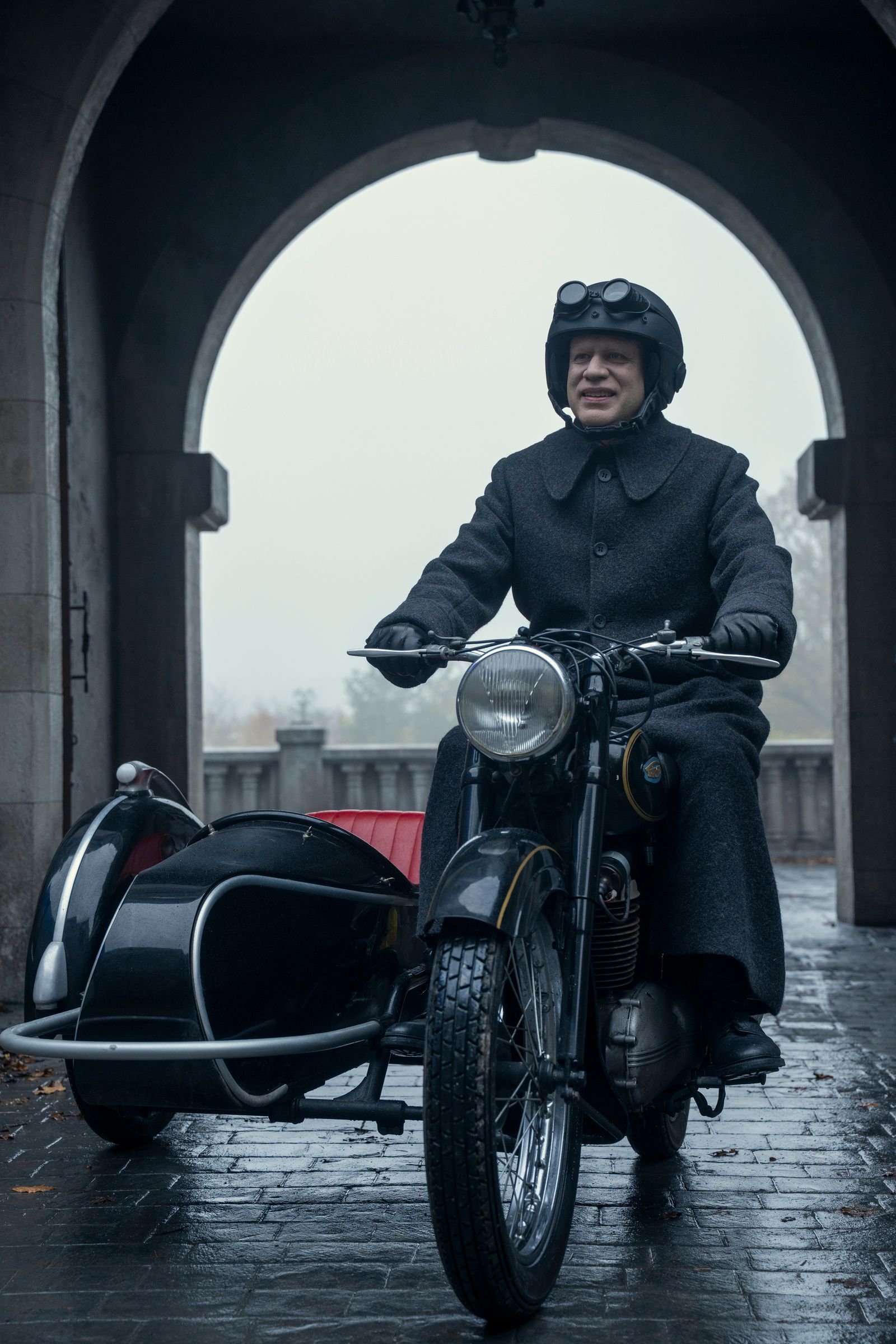 Image may contain Fred Armisen Clothing Glove Adult Person Helmet Motorcycle Transportation Vehicle and Footwear