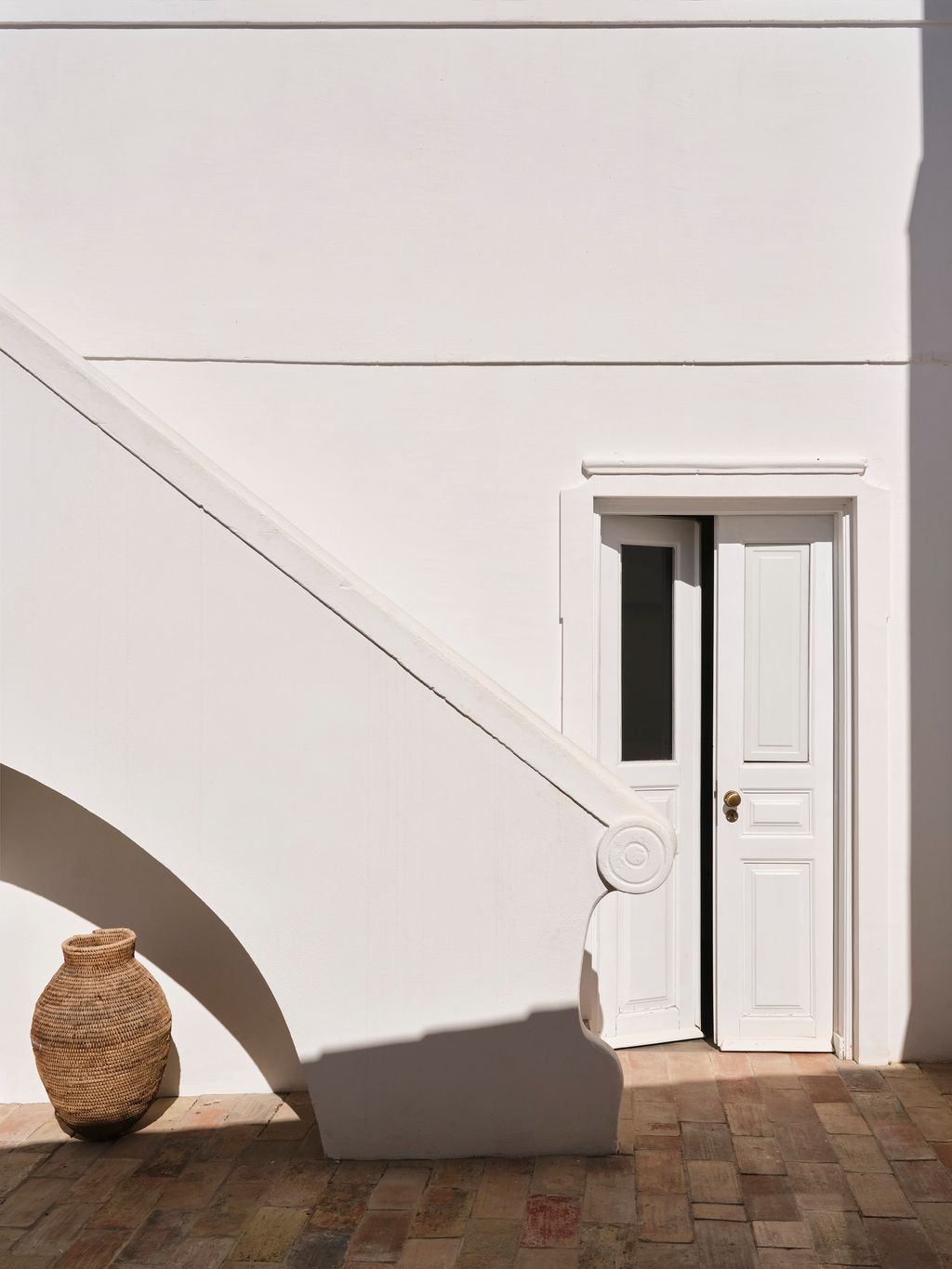 Image may contain Architecture Building House Housing Staircase Door Indoors and Interior Design