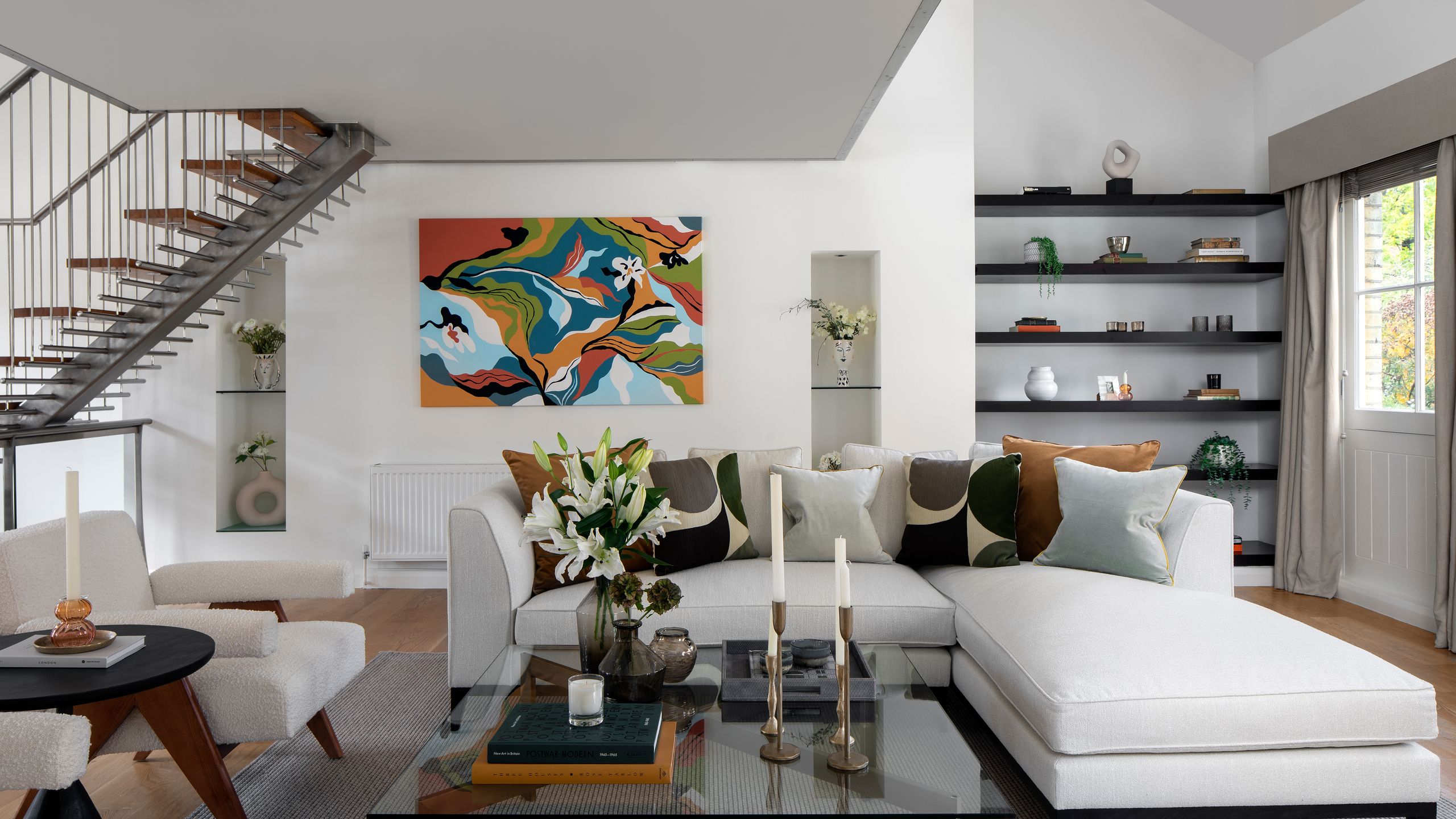 Image may contain: Architecture, Building, Furniture, Indoors, Living Room, Room, Home Decor, Table, Coffee Table, and Cup