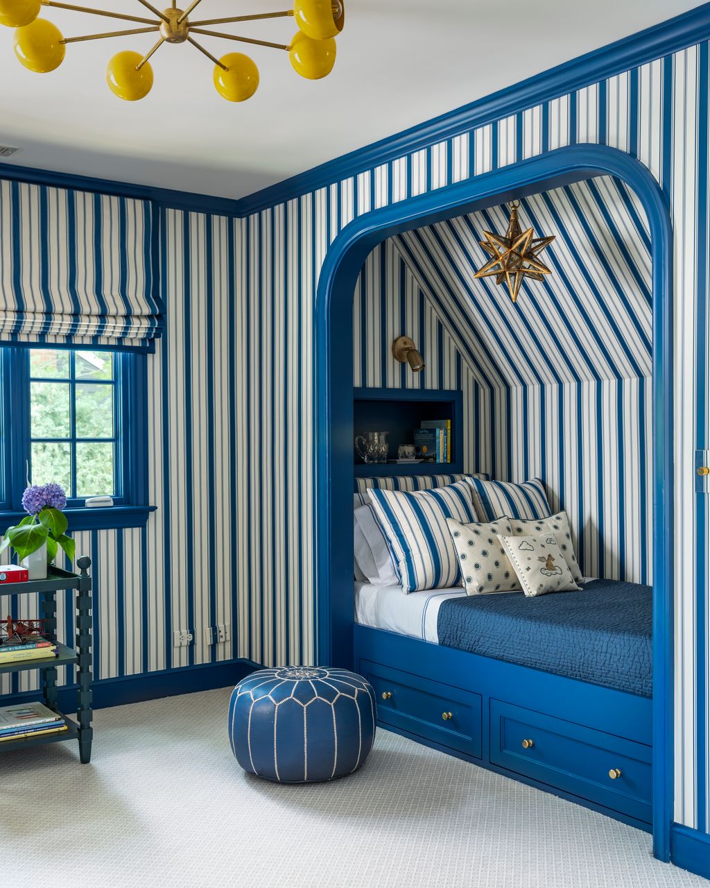 Image may contain Indoors Interior Design Furniture Bed Bedroom Room Lamp Cup Home Decor and Balloon