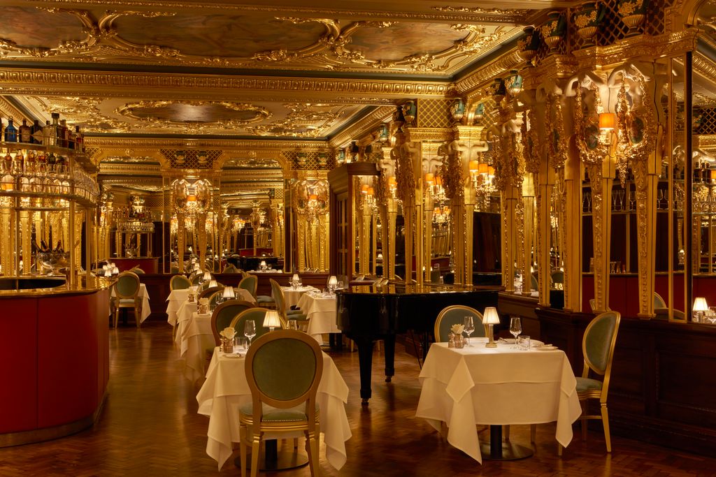 Image may contain Indoors Lamp Fun Hall Chair Furniture Banquet Architecture Building Dining Room and Dining Table