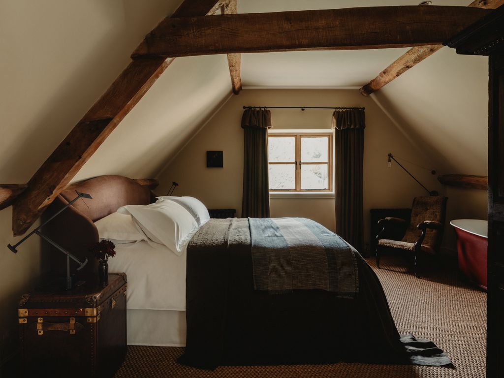 If youve got an attic bedroom with low or sloping ceilings you can still make a headboard work. In fact it can inspire a...