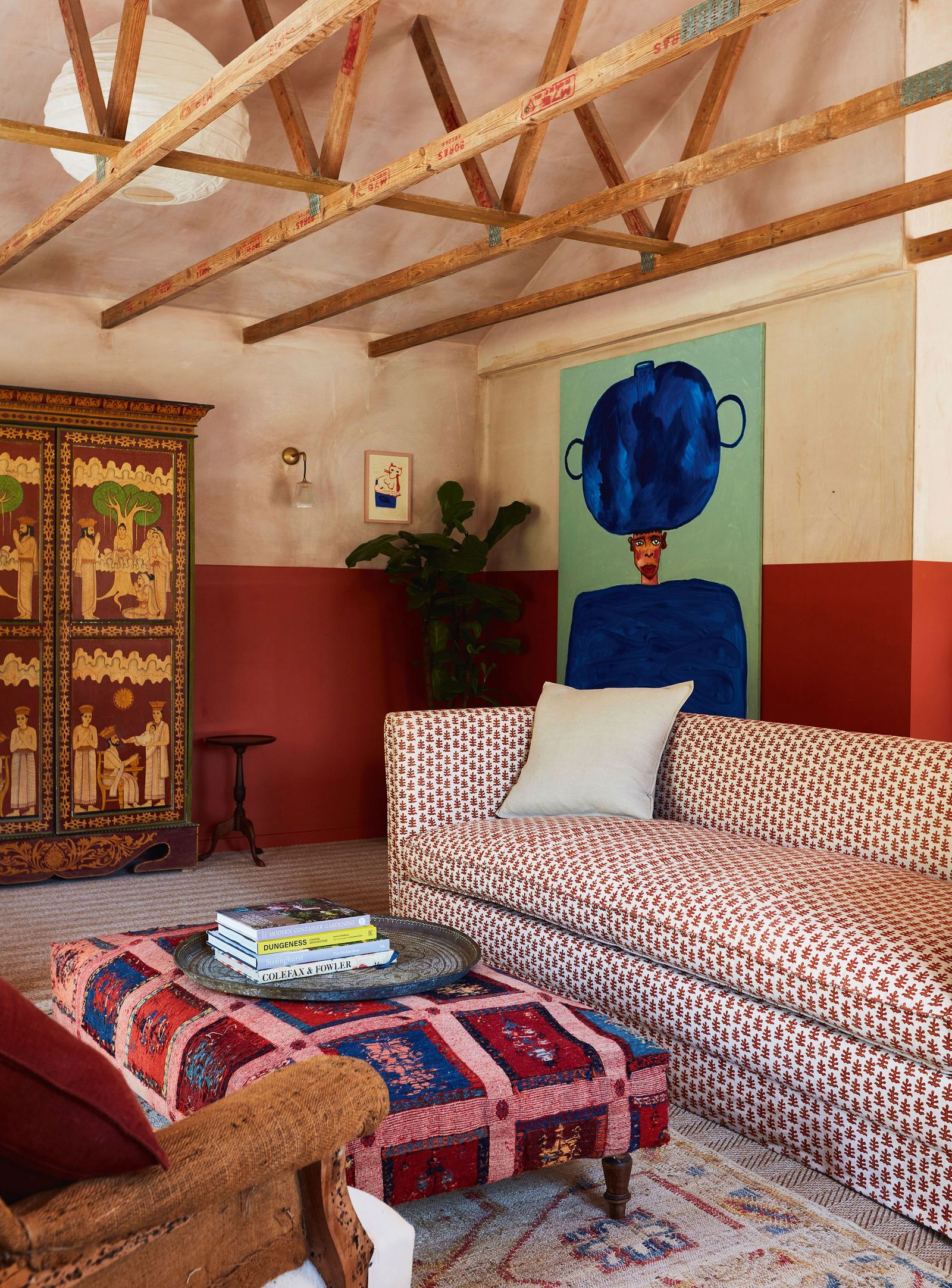 Original architectural features are set off by rich colour and bold pattern in the drawing room of the Gatehouse at...