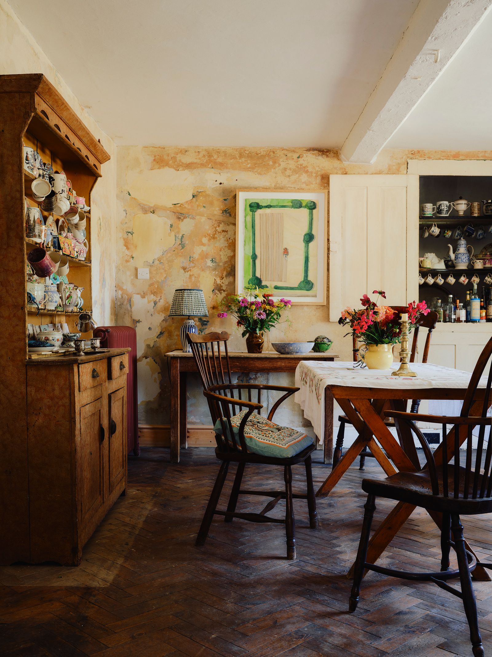 Collected objects add character to the kitchen in Matthew Rice's house in Oxfordshire