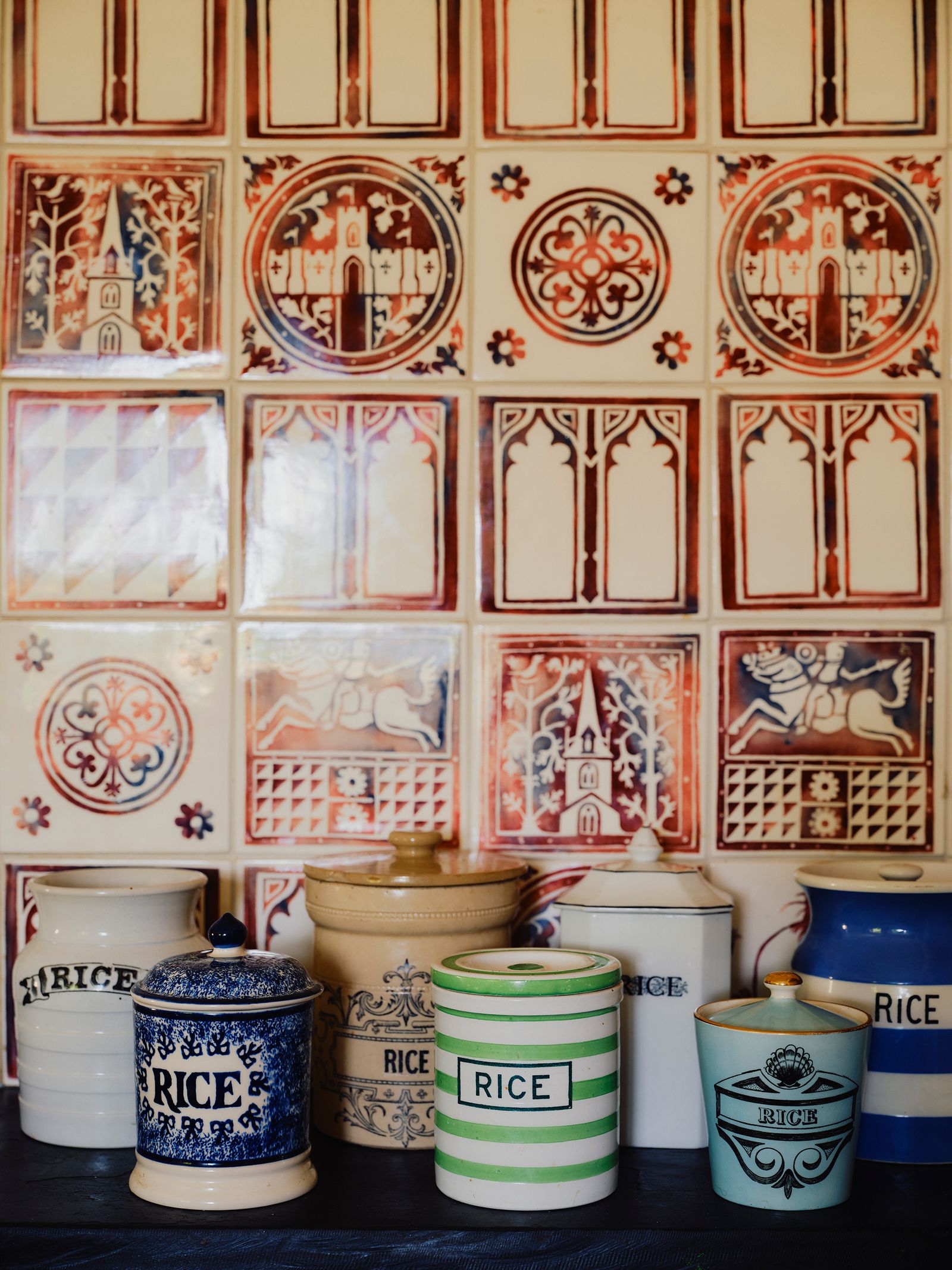 Handpainted tiles referencing medieval architecture in Matthew Rice's house