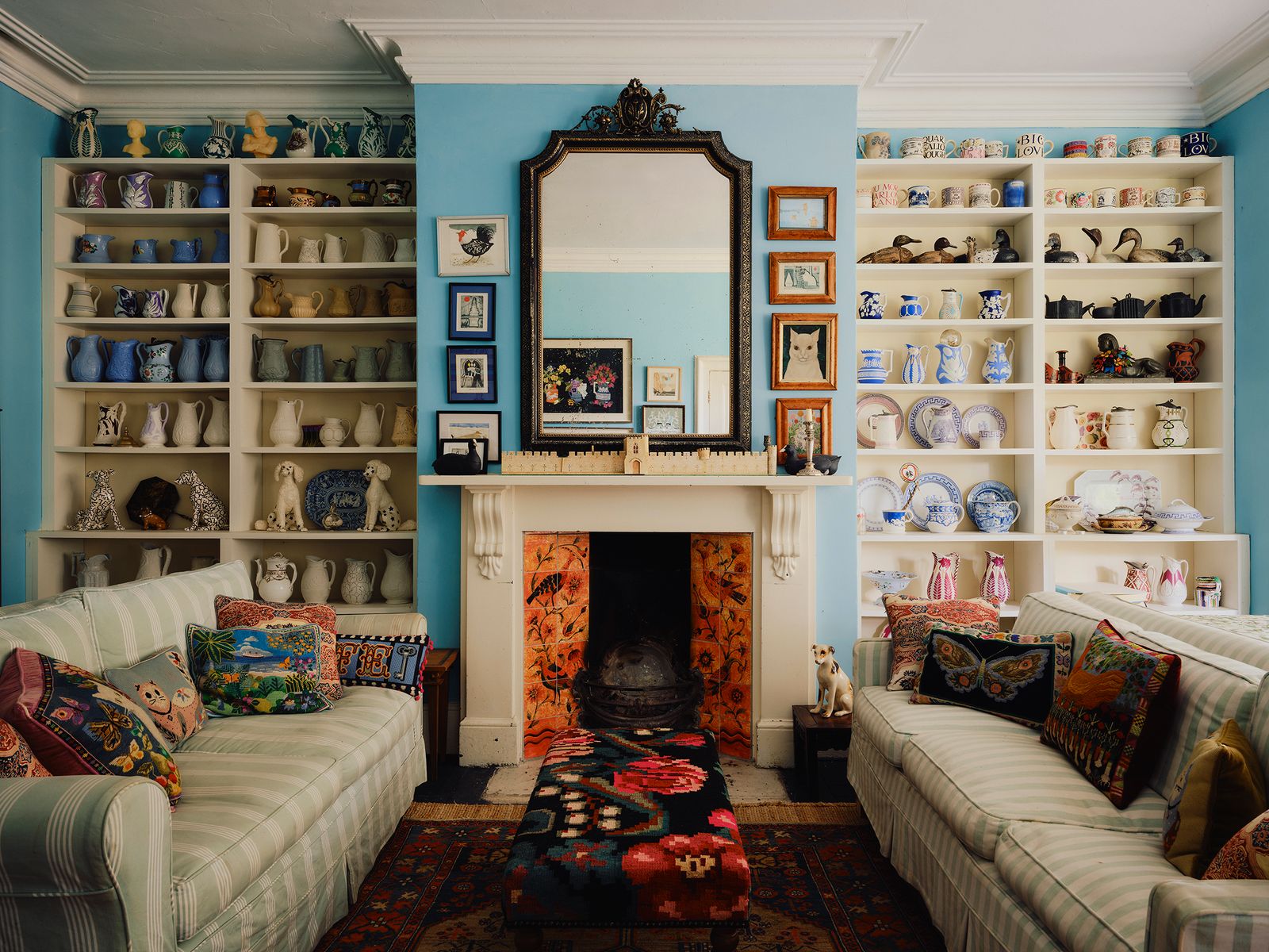 The living room is filled with quirky family keepsakes. Matthew recently painted the walls himself in a vivid turquoise....