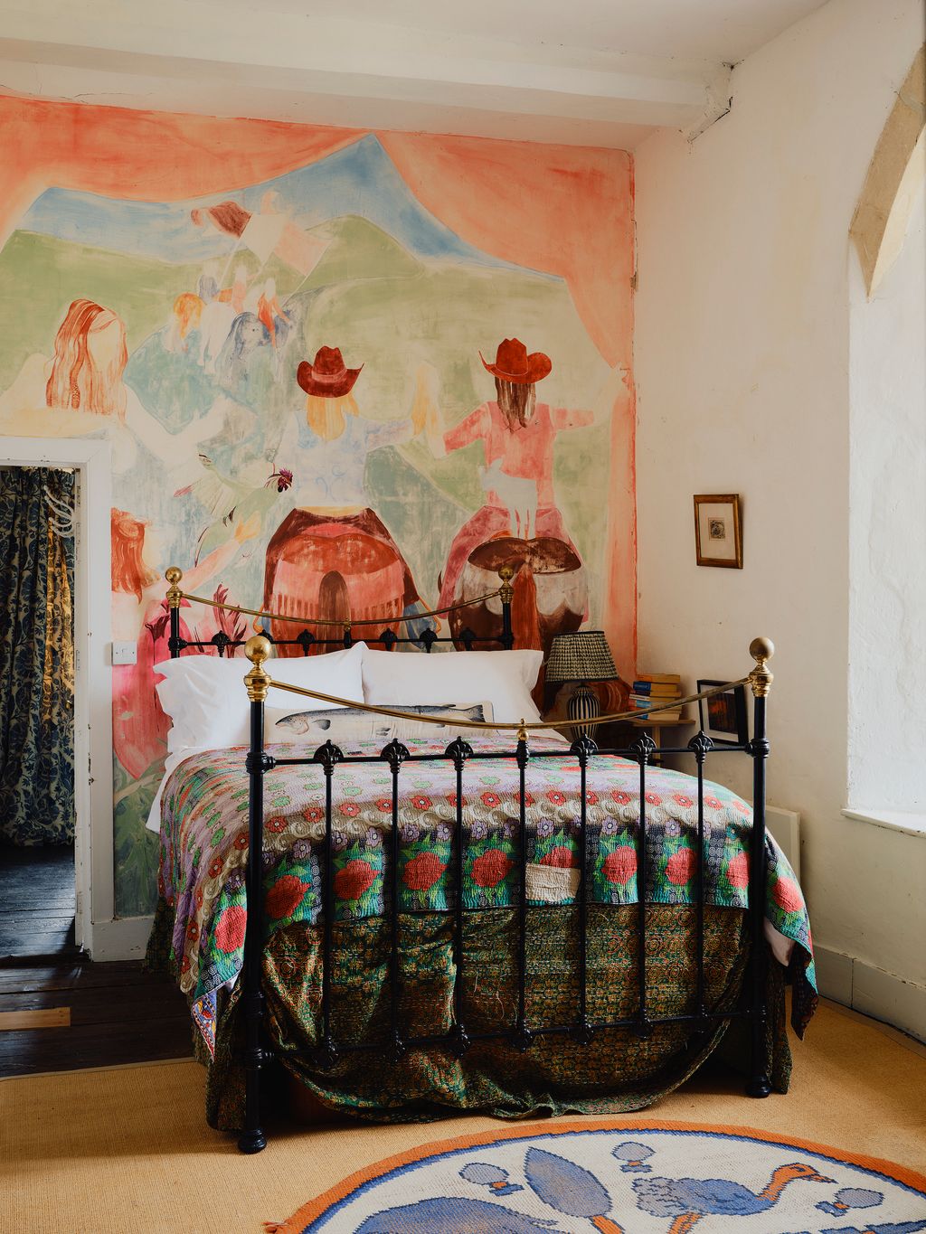 Colourful murals in one of the guest bedrooms.