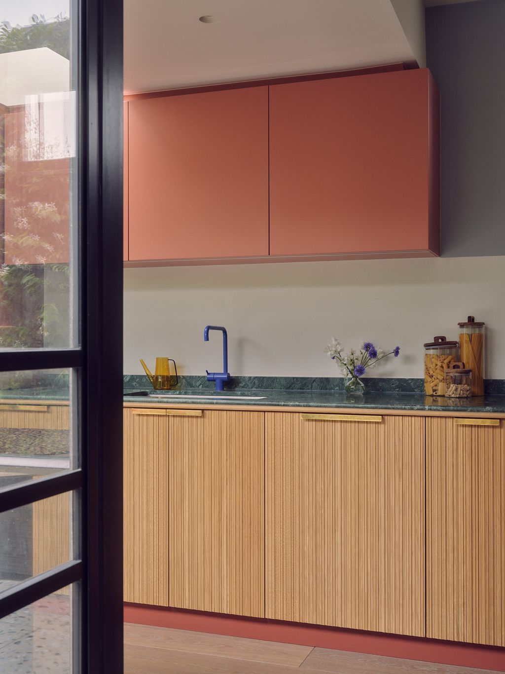 Reeded cabinet fronts help to add texture in the kitchen.