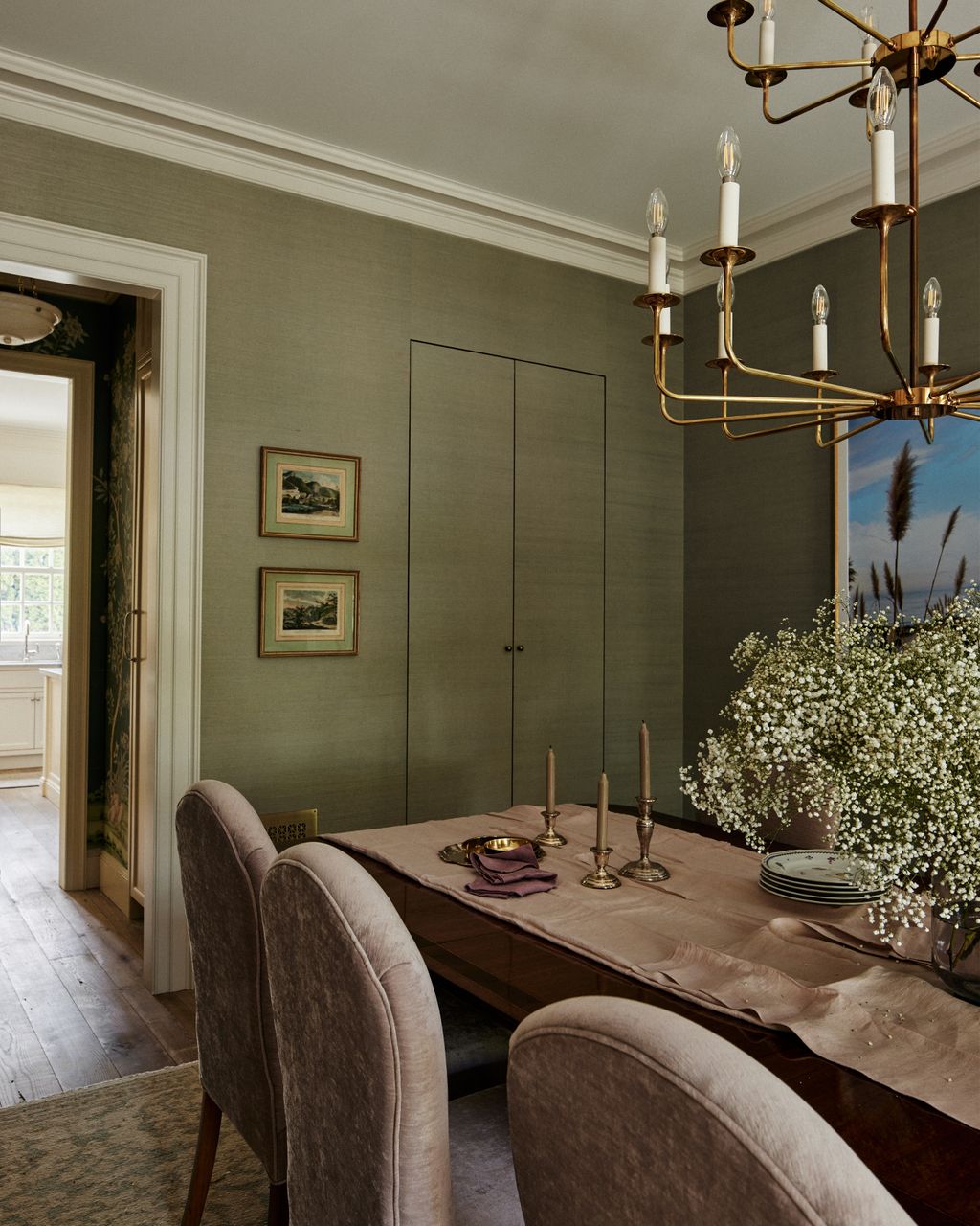 It was important to the clients that the dining room be a social but calm space. Rhiannon opted for a grasscloth wall...