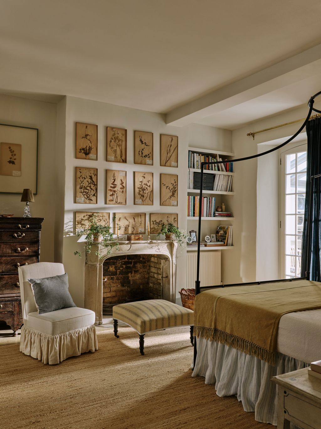The antique framed botanicals were discovered at a flea market in France. The ottoman is also antique upholstered in...