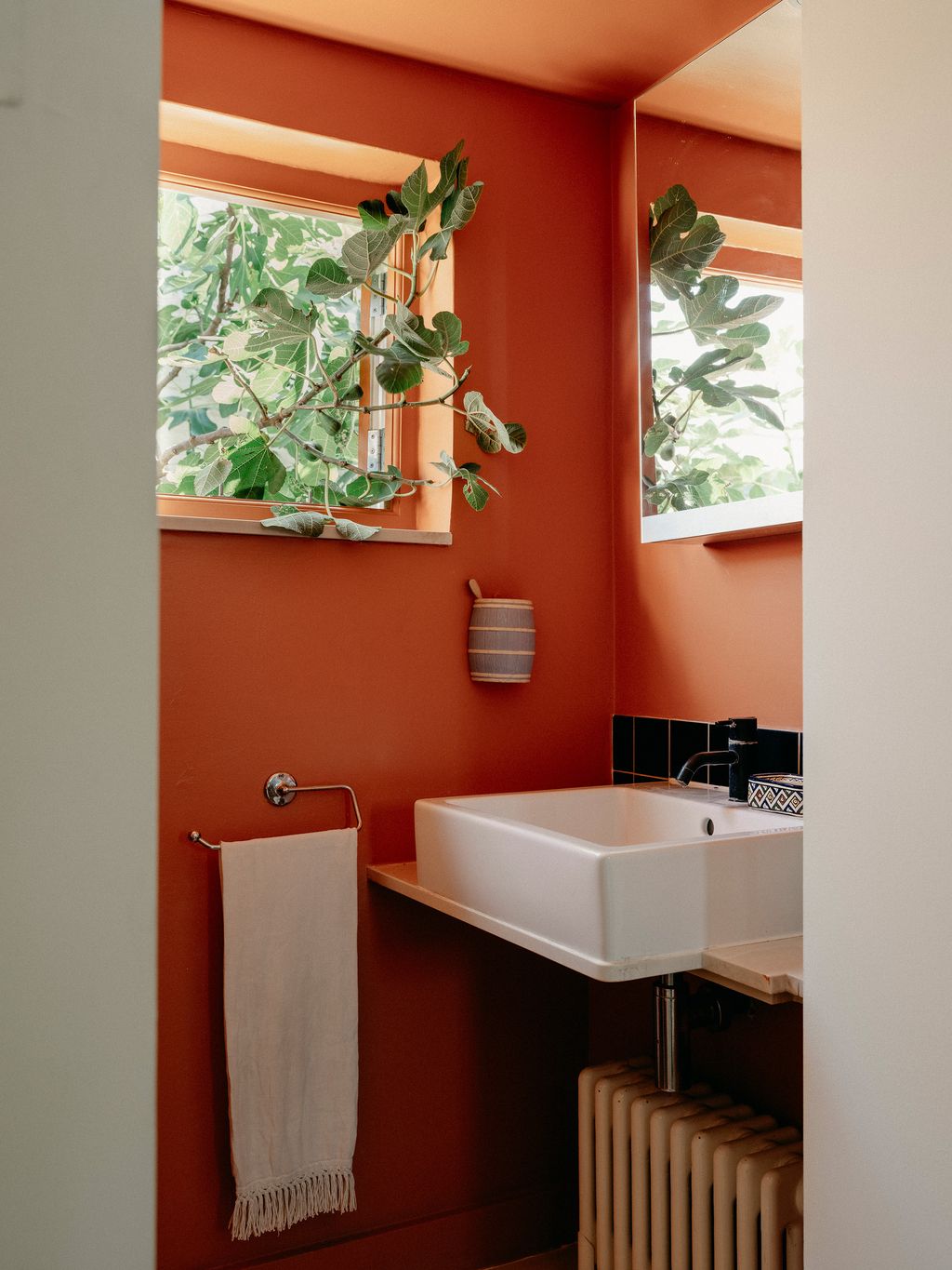 Recently Tarka painted the little bathroom on the landing in a Morris Co russet.