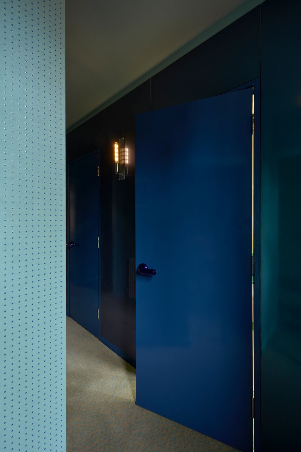 Looking back down the hallway from the spare room nbspthe open door leads into the bathroom.