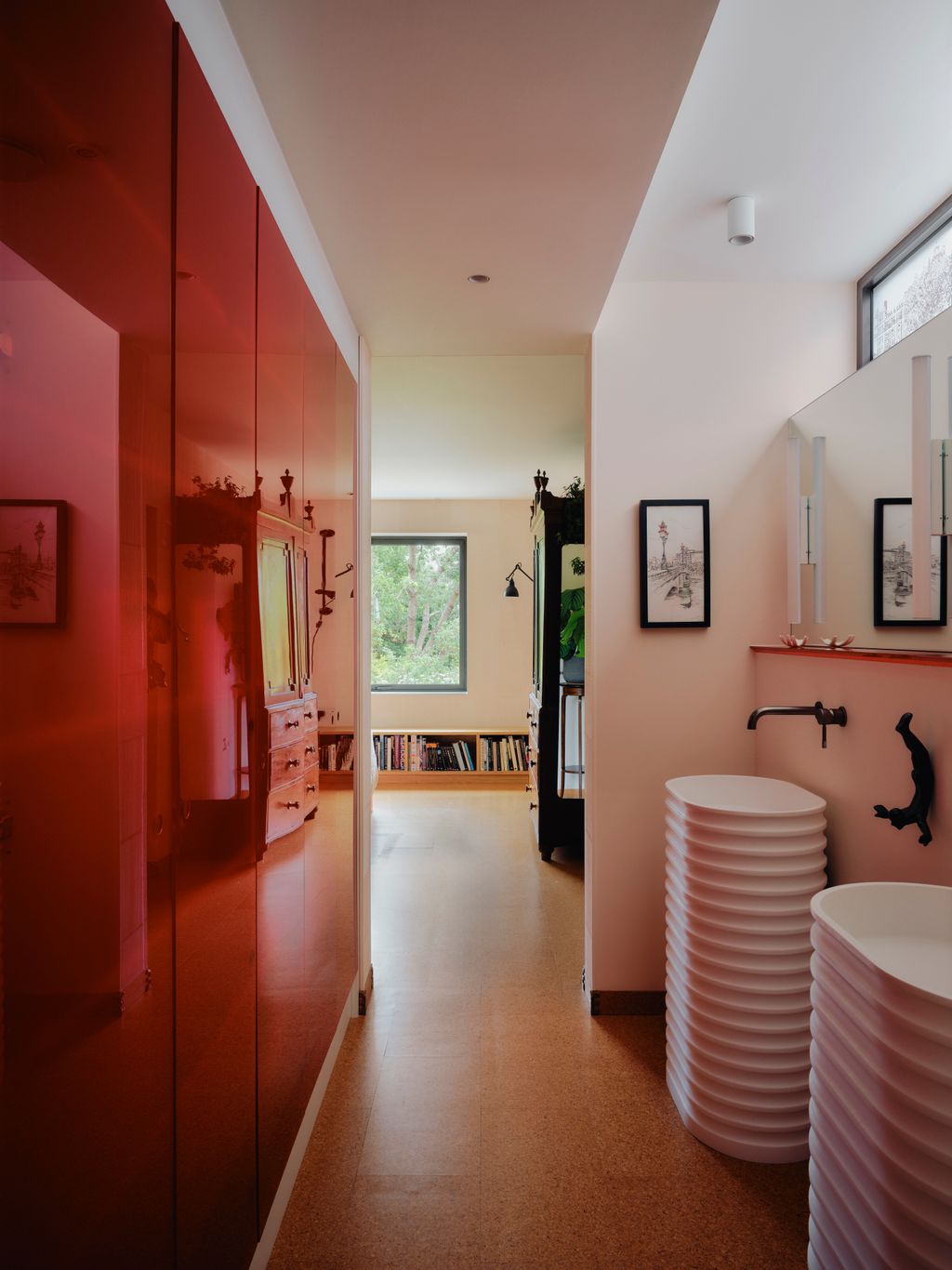 Red Perspex panels from Retrouvius are repurposed as doors for walltowall bathroom storage set against walls in Little...