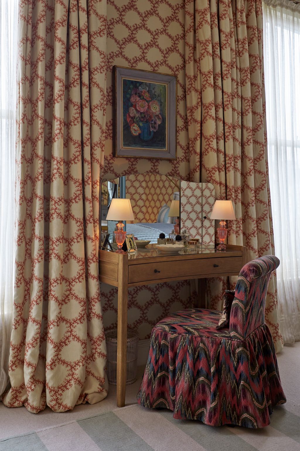 A chair in Zoffanys ‘Kempshott in sunstone partners an Oka dressing table.