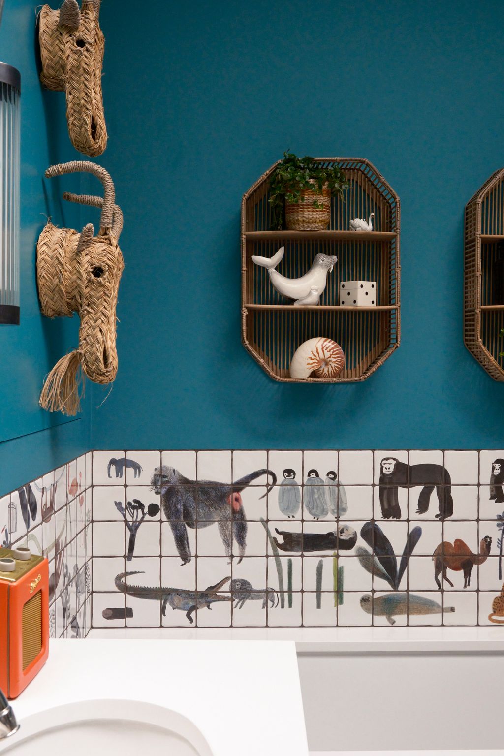 Charlotte collected the rattan animal heads on her travels but recommends searching Etsy for similar designs. The bamboo...