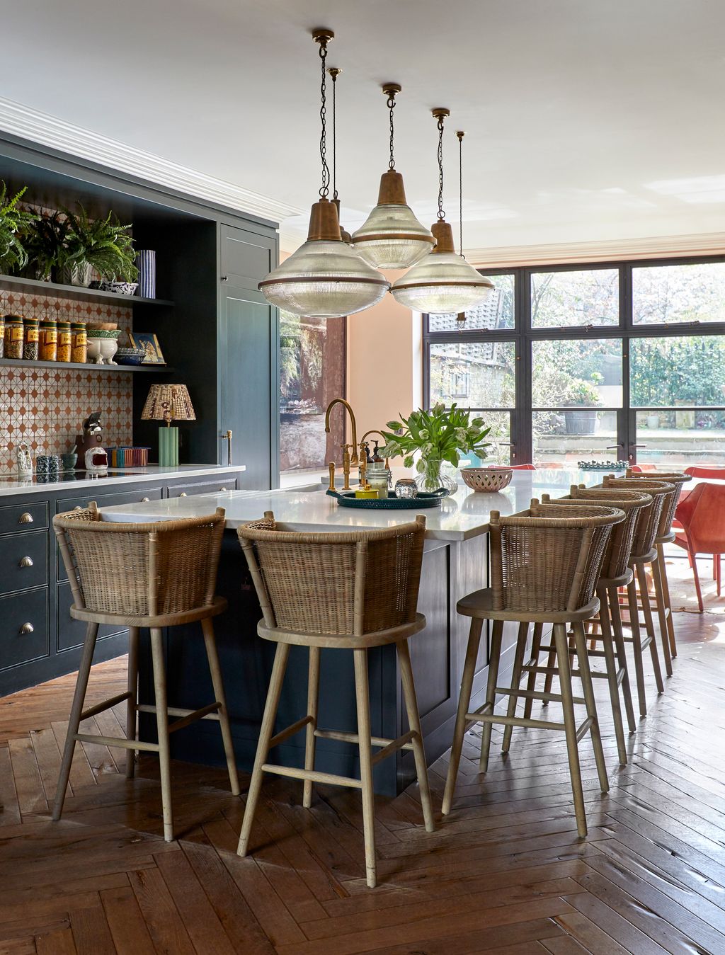 Designed by AA Architects and made by Bonchurch the kitchen cabinets and island are painted in Farrow  Balls ‘Studio...