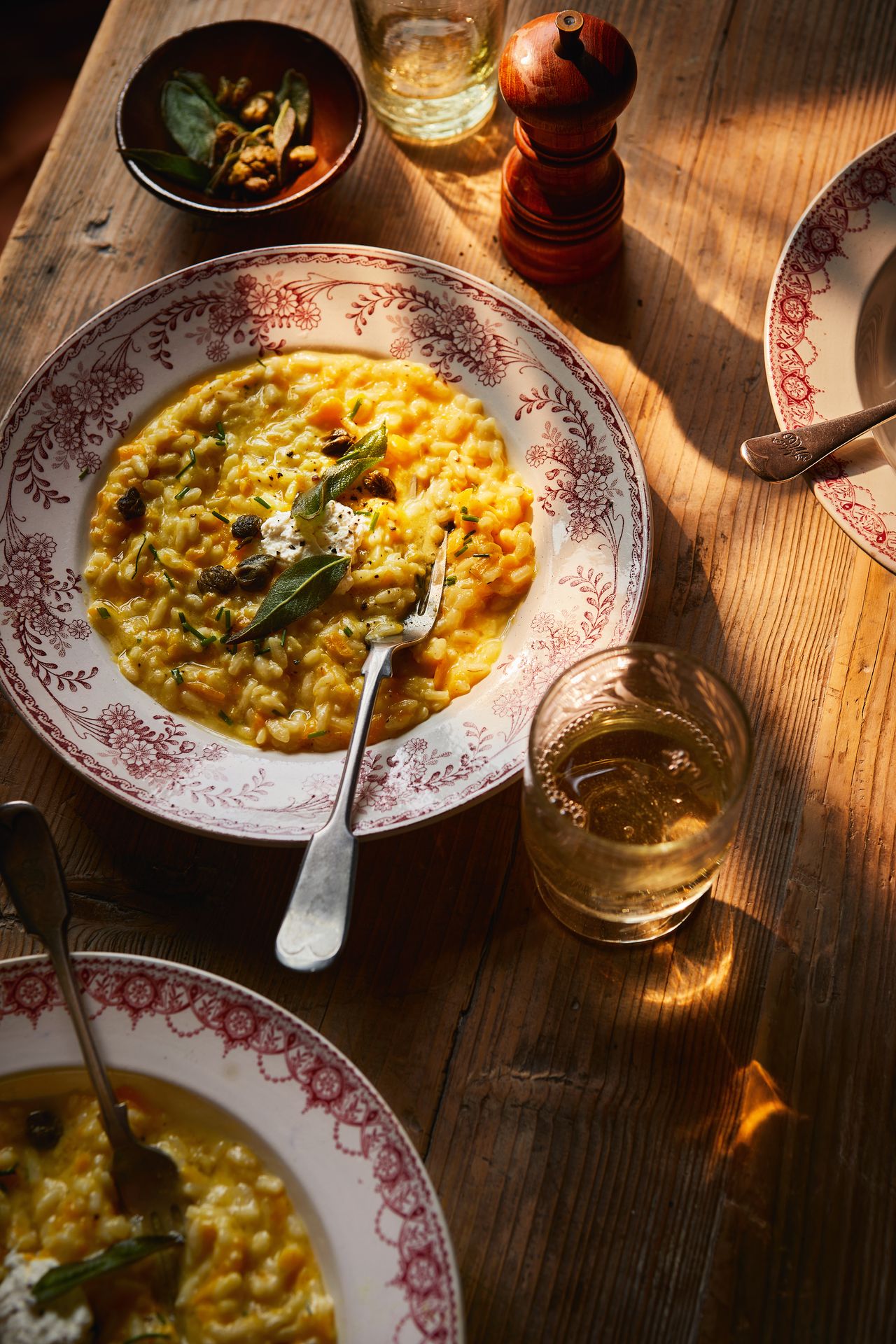 Squash and ricotta risotto with crispy capers and sage