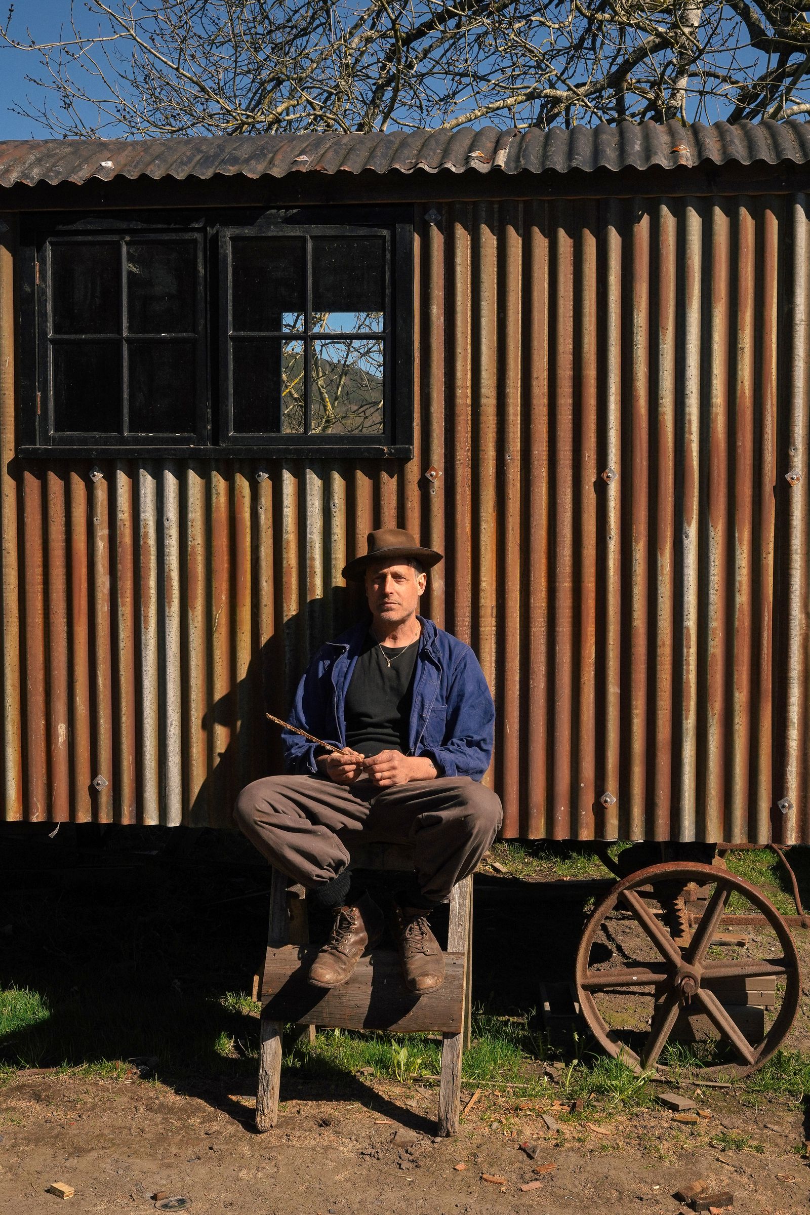 Artist and maker Rollo Dunford Wood outside one of his shepherds huts a space that reflects his love of craftsmanship...