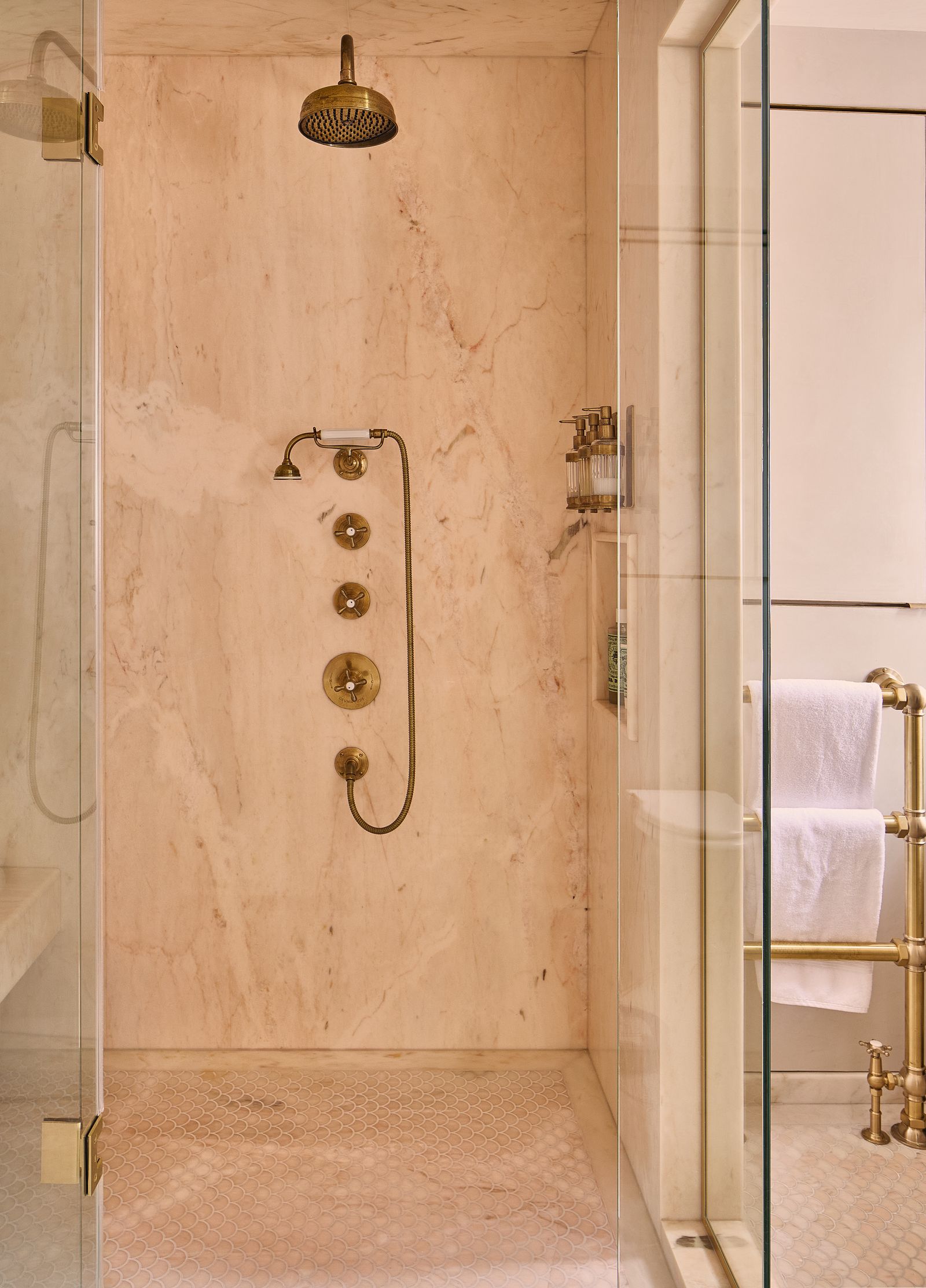 Inside Kate Mosss chic bathroom and 7 decor ideas to steal  pale pink bathroom with marble clad walls and unlacquered...