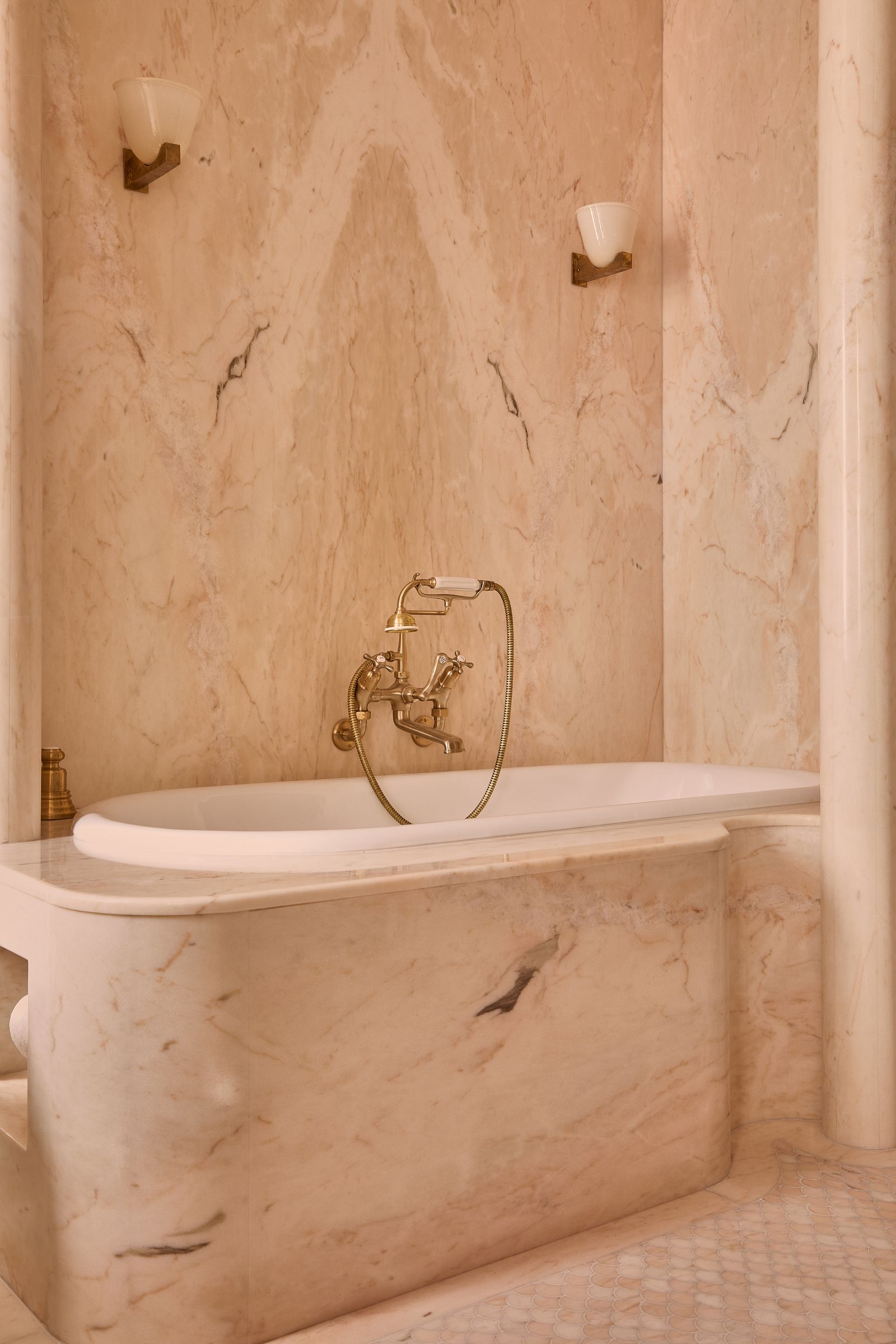 Inside Kate Mosss chic bathroom and 7 decor ideas to steal  pale pink bathroom with marble clad walls and unlacquered...