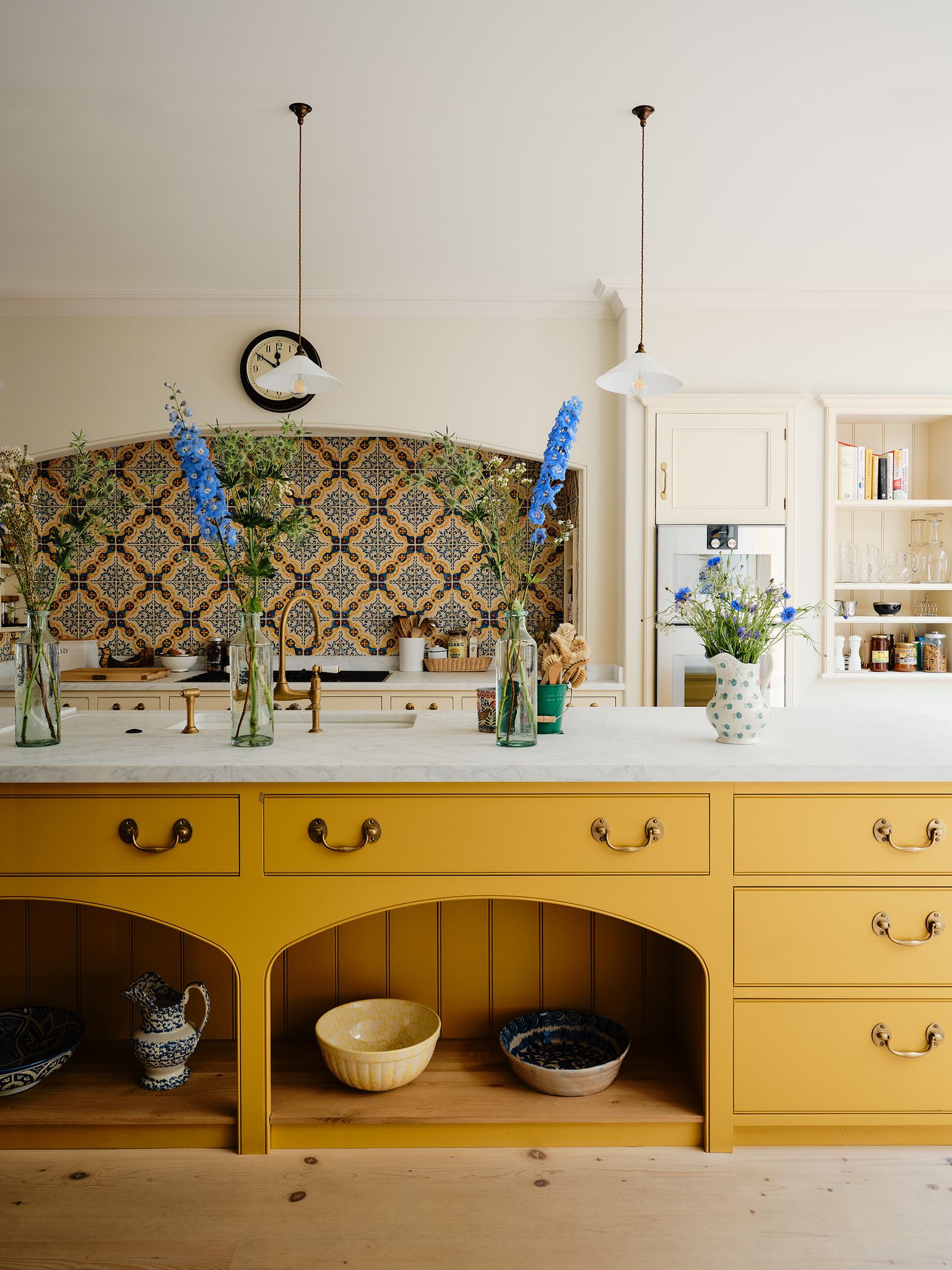 Kitchen tiles designed by Serena and made in Italy set the tone in the kitchen. The island is painted in Paper and...