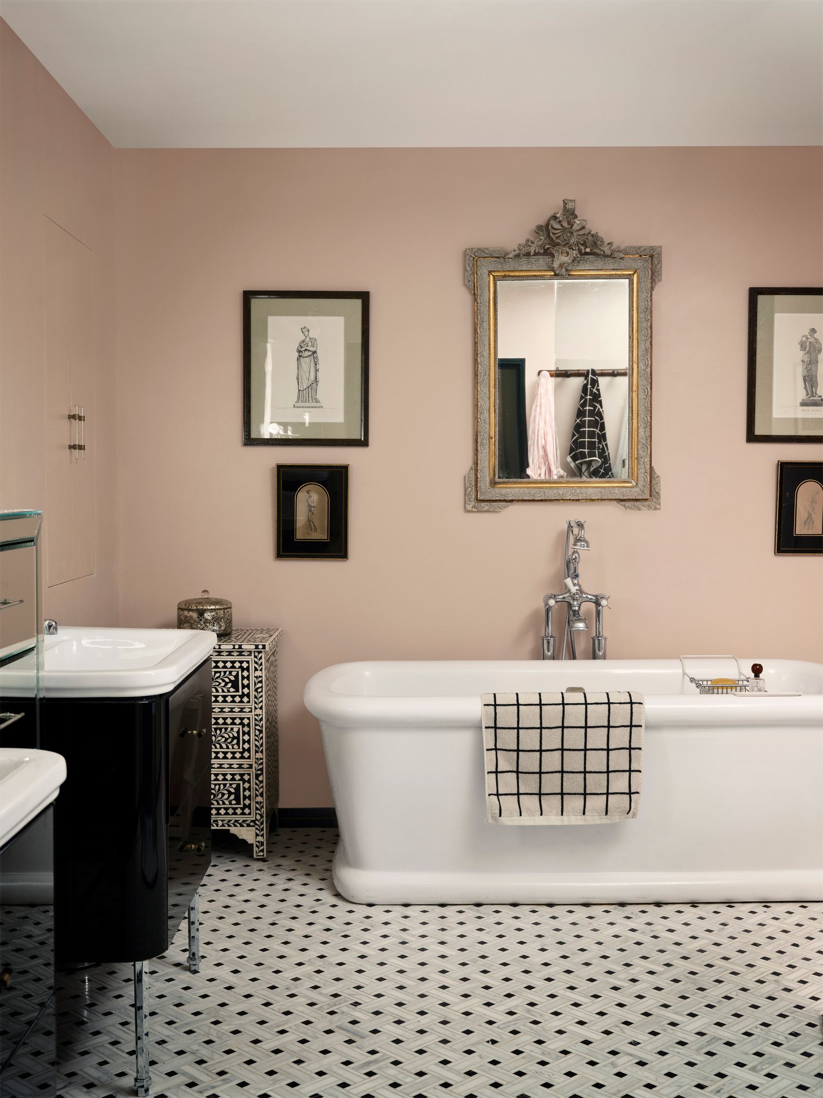 Geometric flooring and an inlaid cabinet bring pattern to the chic scheme.