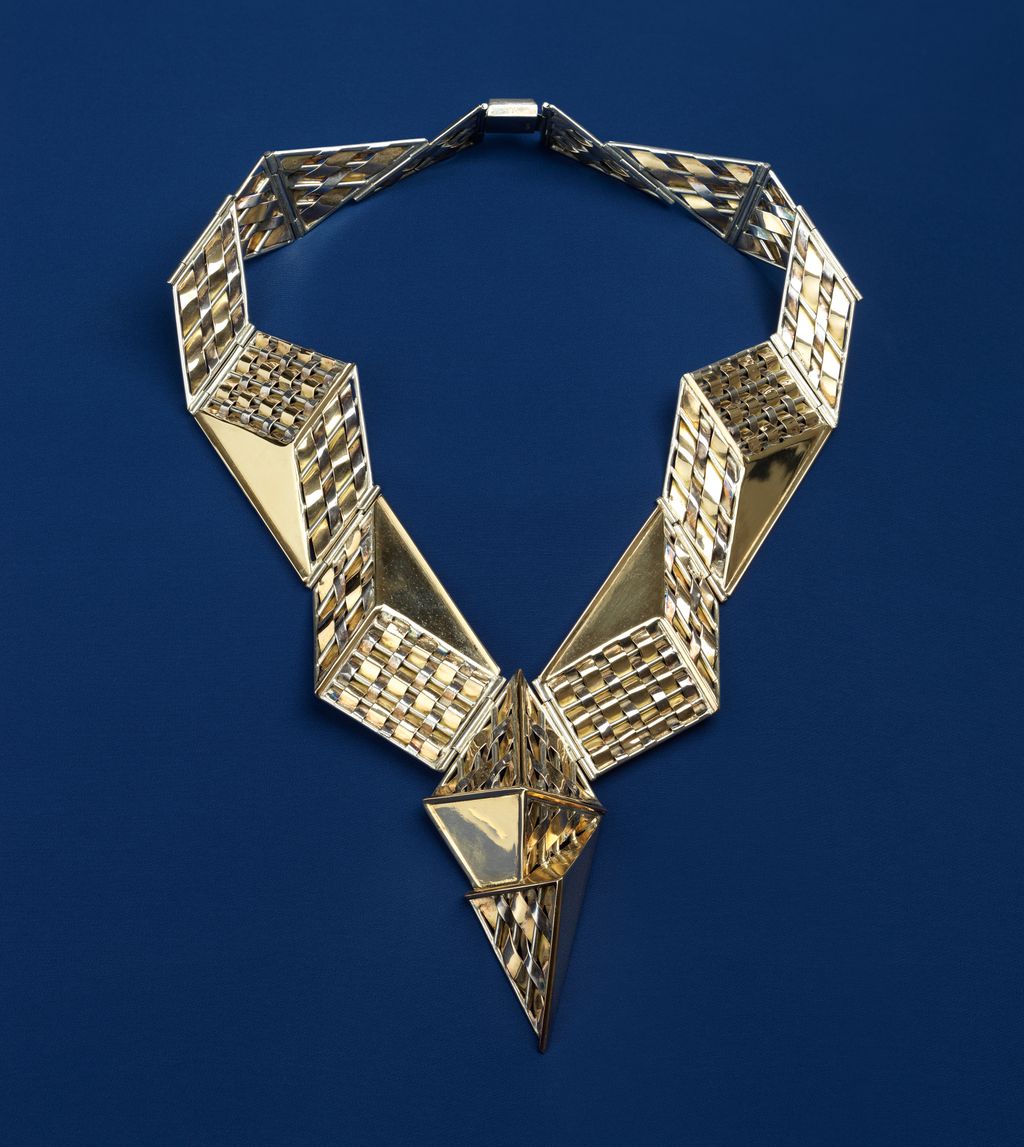 With its architectural geometry and articulated links this prismatic weave necklace by William de Lillo c. 1969 is...