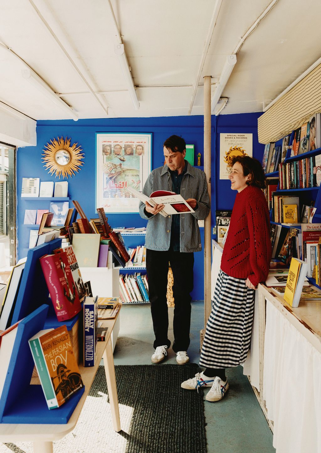 Cruz and George in his shop in Shepherds Bush Market W12 Special Rider Books Records.